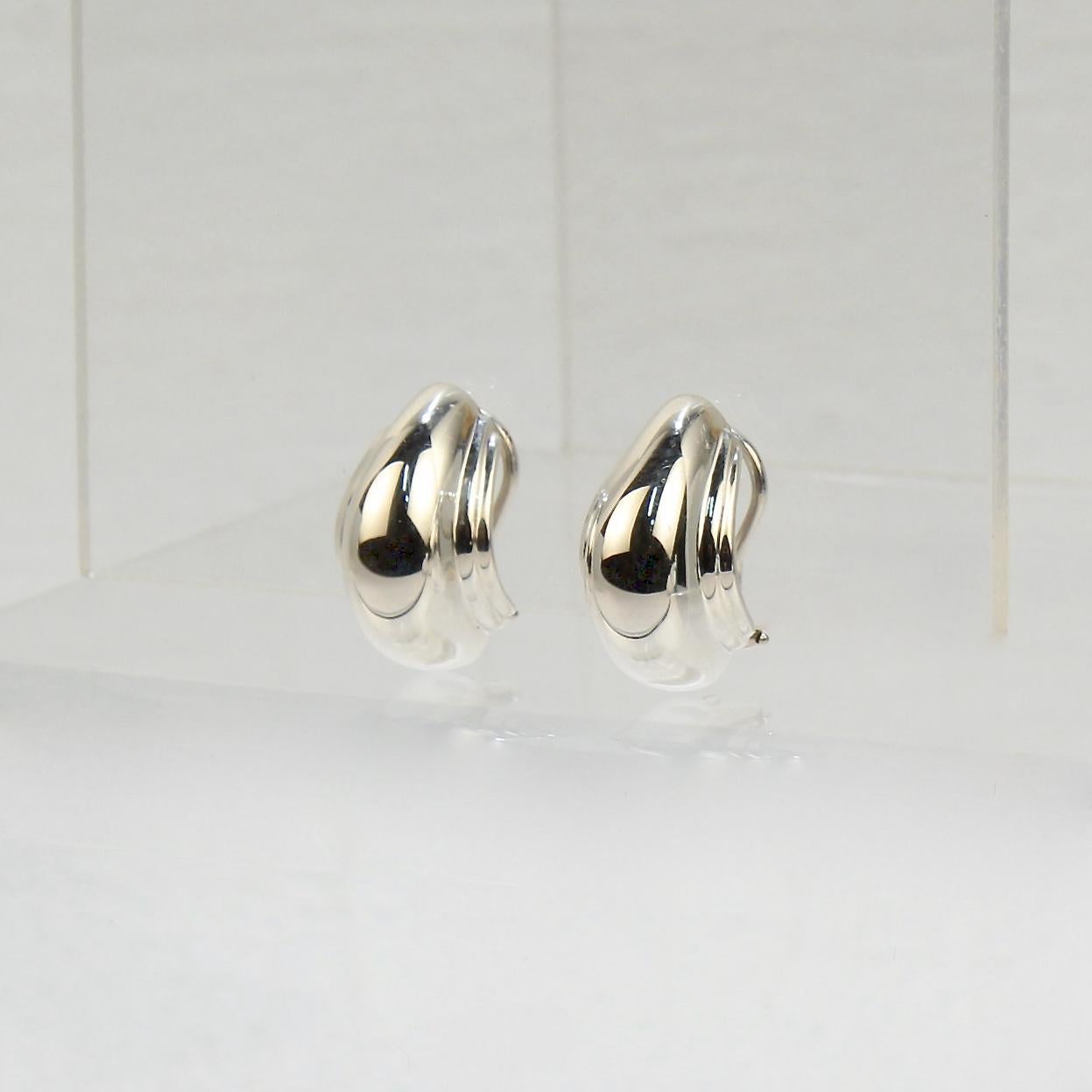 A very fine pair of Tiffany & Co earrings.

In sterling silver.

Designed by Paloma Picasso.

Date:
20th Century

Overall Condition:
They are in overall good, as-pictured, used estate condition with some fine & light surface scratches, and other