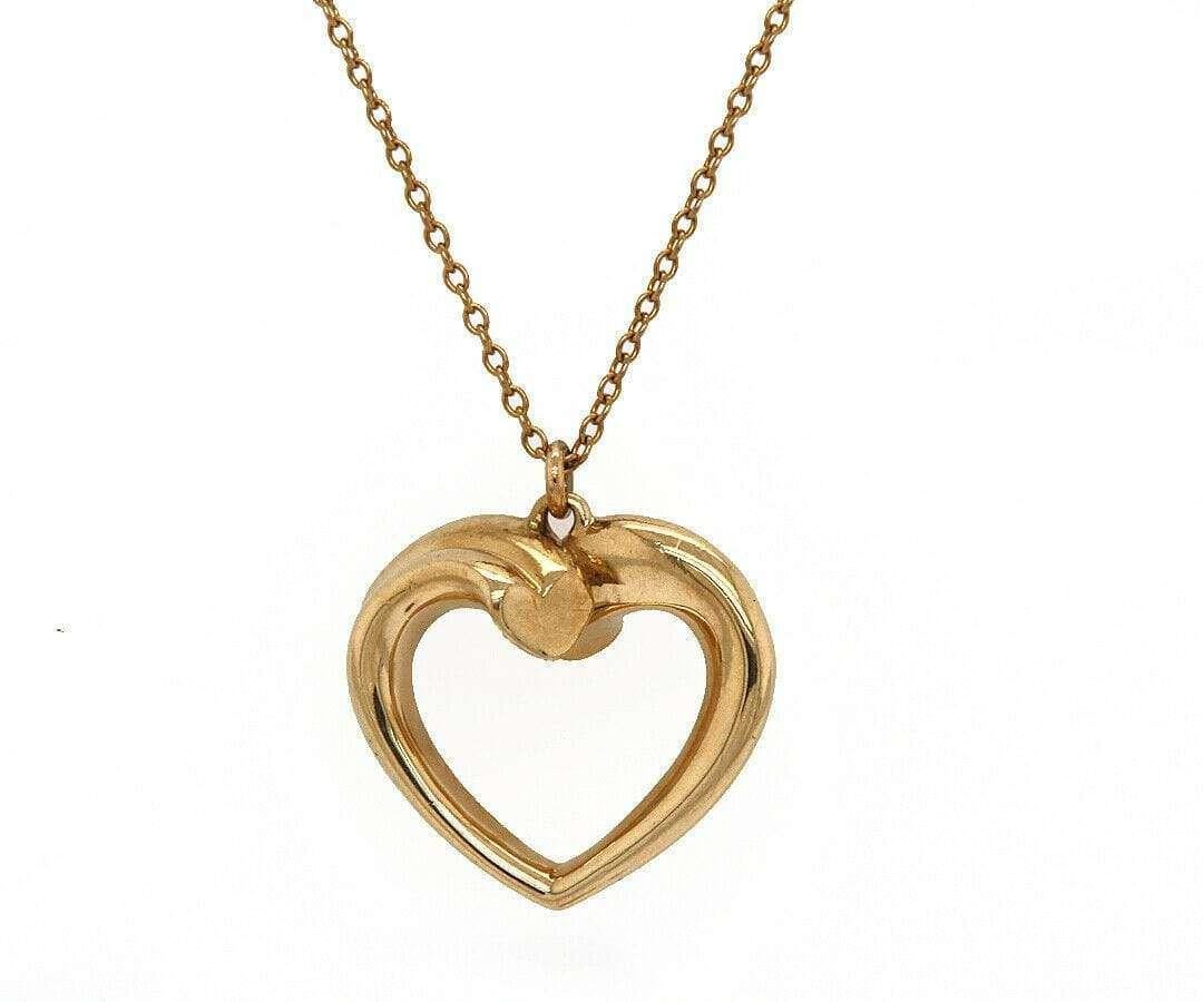 Tiffany & Co Paloma Picasso Tenderness Heart Pendant in 18K Yellow Gold

Tiffany & Co
Paloma Picasso Tenderness Heart Pendant
18K Yellow Gold
Heart Size: Approx. 18.0 Mm
Chain Length: Approx. 21.0 Inches
Weight: Approx. 6.90 Grams
Stamped: T & Co,