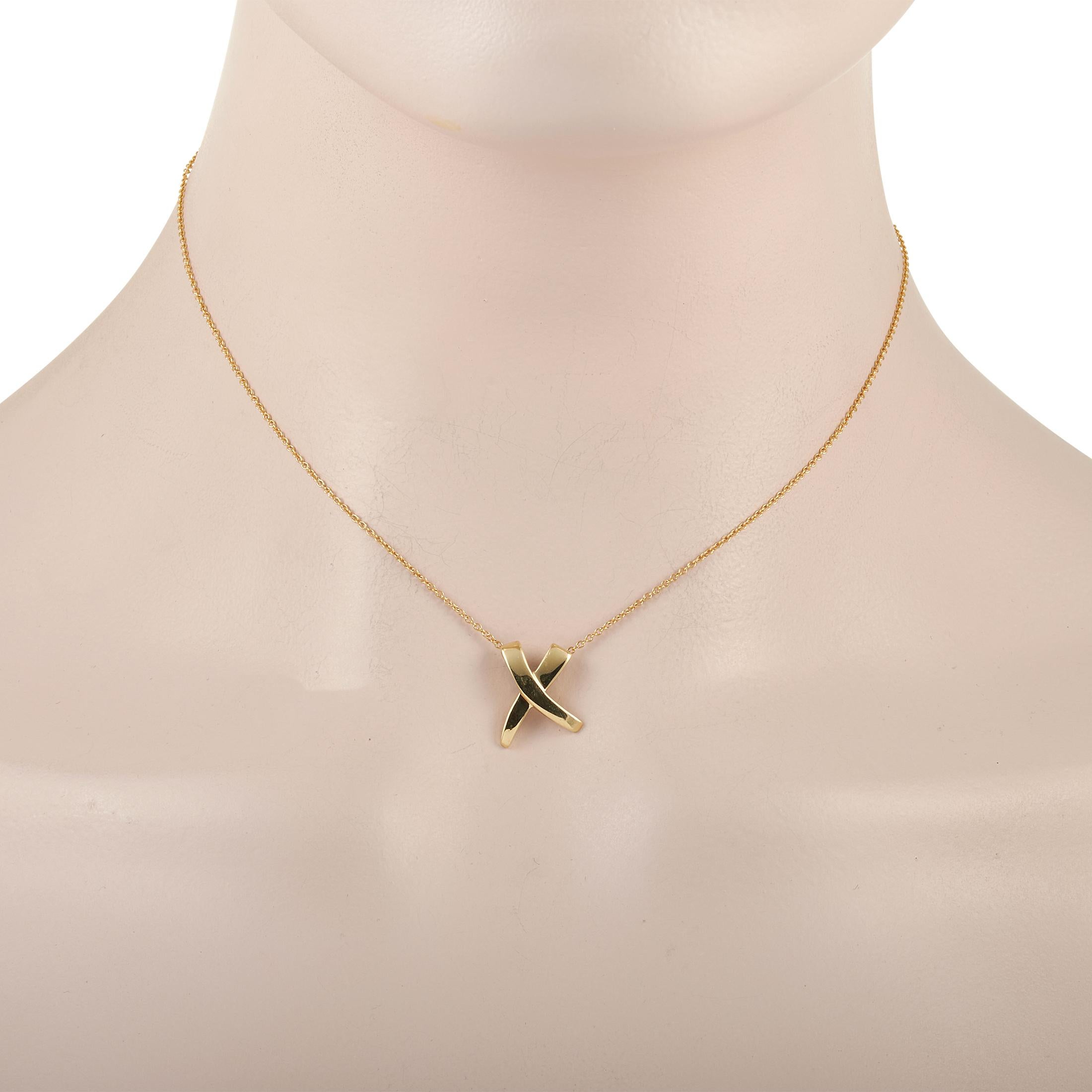 For the young and the young-at-heart, here is a Tiffany & Co. Paloma Picasso X Graffiti 18K Yellow Gold Pendant that's elegant and artsy. The pendant is an 