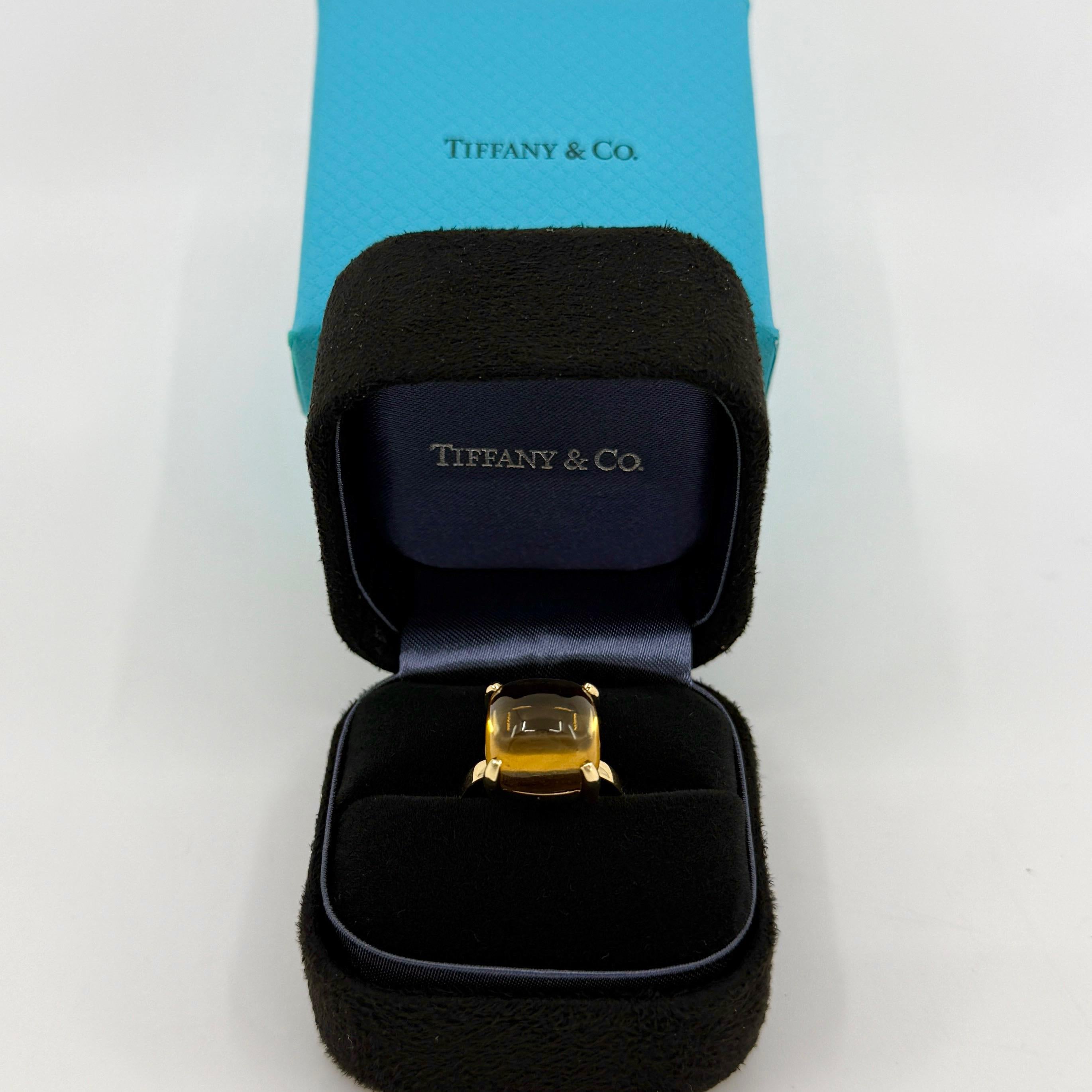 Vintage Tiffany & Co. Paloma Picasso Orange Yellow Citrine Lemon Quartz Sugar Stack 18k Yellow Gold Ring.
Large stone size, rare piece.

A beautiful sugarloaf yellow orange citrine ring from the Tiffany & Co. Paloma Picasso collection.

Fine