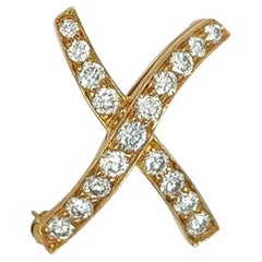 TIFFANY & CO., PALOMA PICASSO  Yellow Gold and Diamond "X Kiss" Brooch