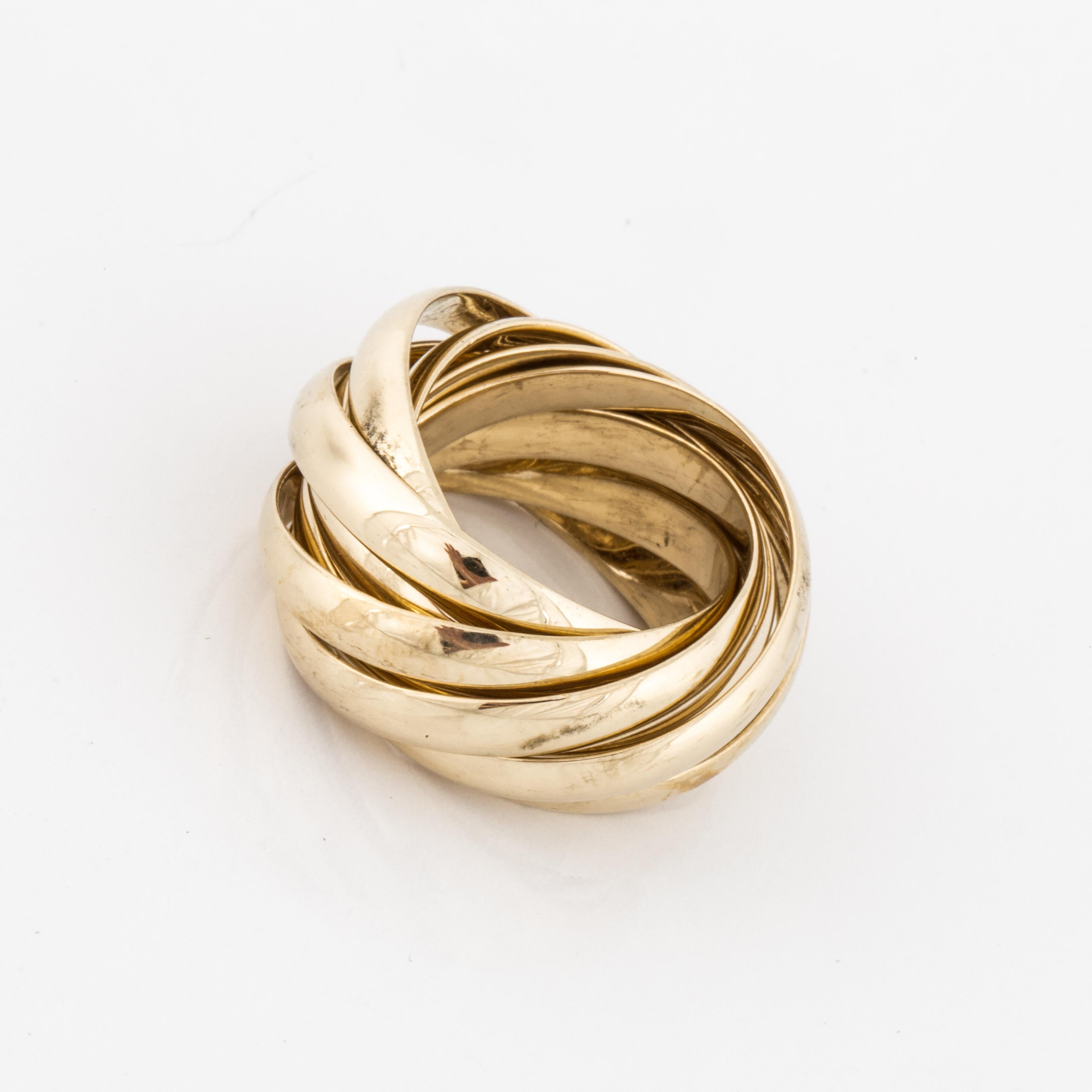 18K yellow gold Calife ring by Paloma Picasso for Tiffany & Co.  Features nine (9) bands measuring 1/8