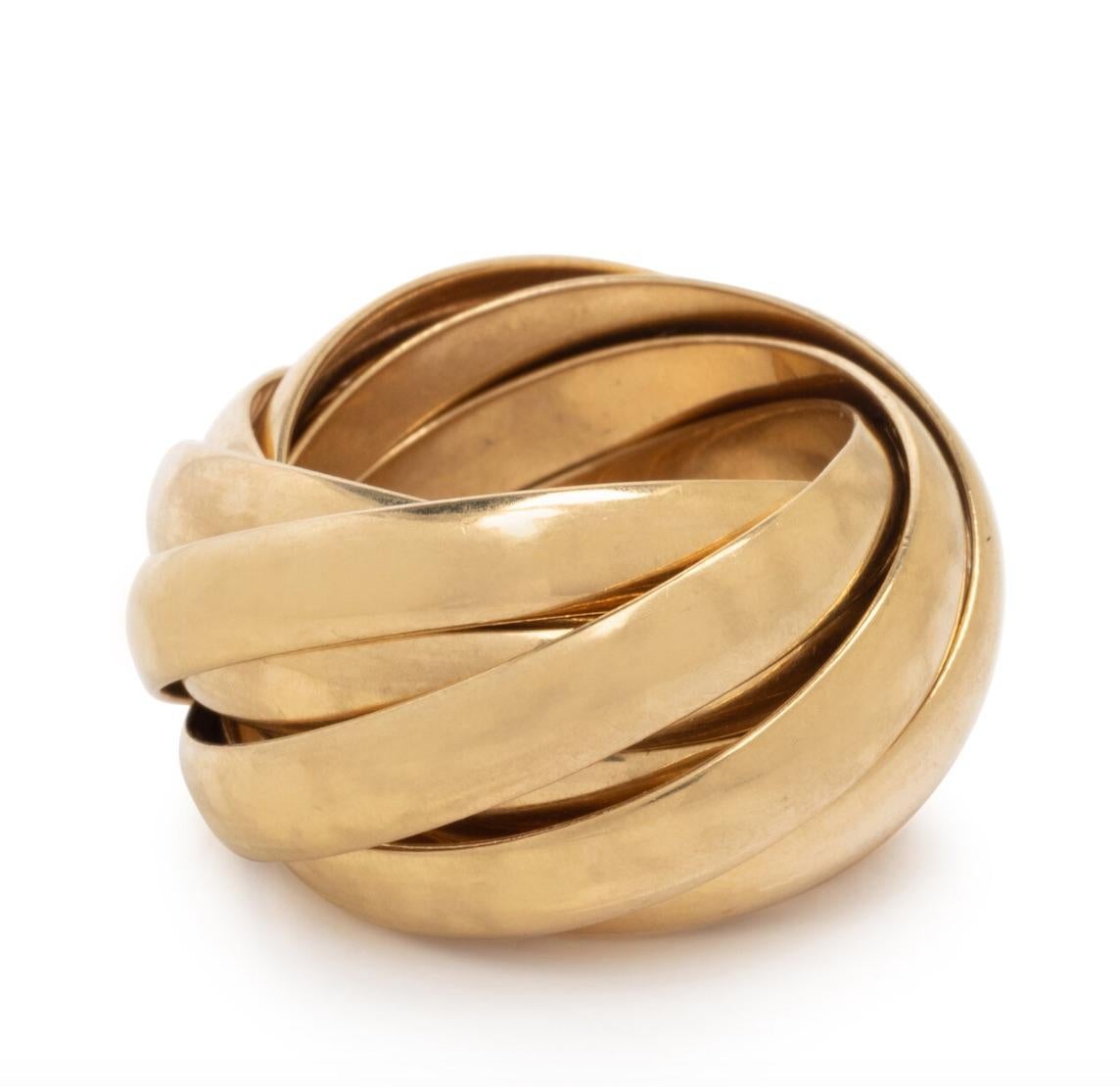 Dieses klassische Tiffany-Design von Paloma Picasso aus der Collection'S Melody besteht aus neun ineinander verschlungenen Ringen. Dieses aus 18 Karat Gelbgold gefertigte  Design rollt direkt auf den Finger.

Metall: 18K
Ringgröße: 6 3/4
Stempel: