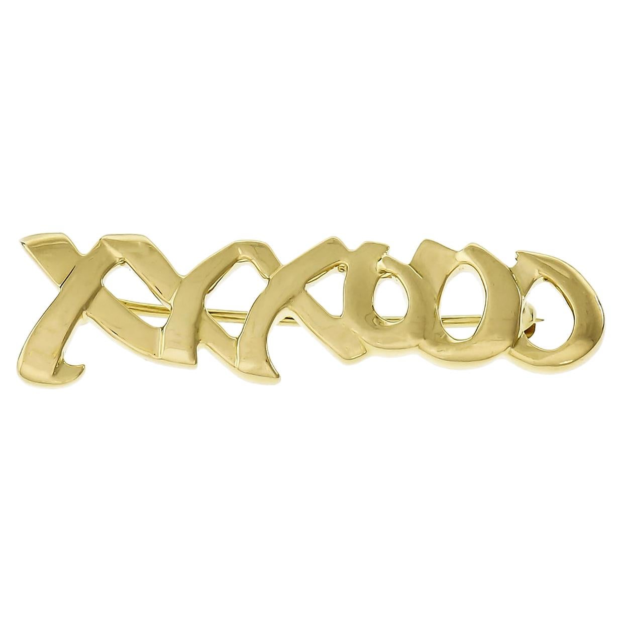 Tiffany & Co Paloma Picasso Broche signature XO en or jaune en vente