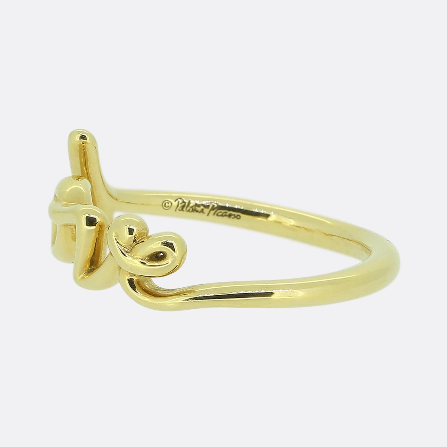 Here we have a charming 18ct yellow gold ring from the world renowned jewellery designer Tiffany & Co. This delicate mini model is designed with a loving sentiment. Featuring Paloma Picasso’s own handwriting, this expressive collection is inspired