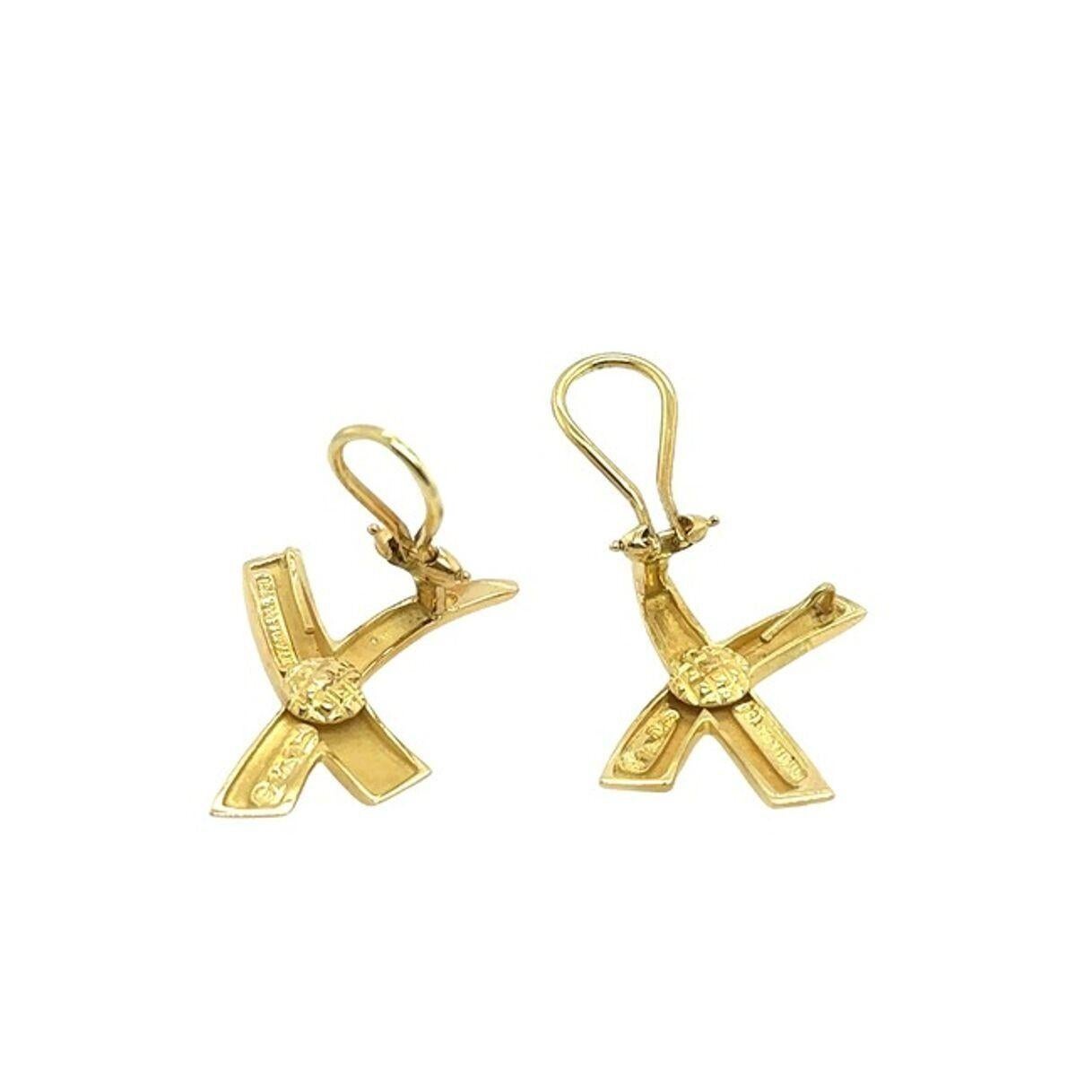 Tiffany & Co. Paloma's Graffiti X Earrings are a perfect pair of earrings for the modern woman. The earrings are crafted with 18ct Yellow Gold and have a total weight of 10.2 grams.

Additional Information:
Total Gold Weight: 10.2g 
Earring Size: