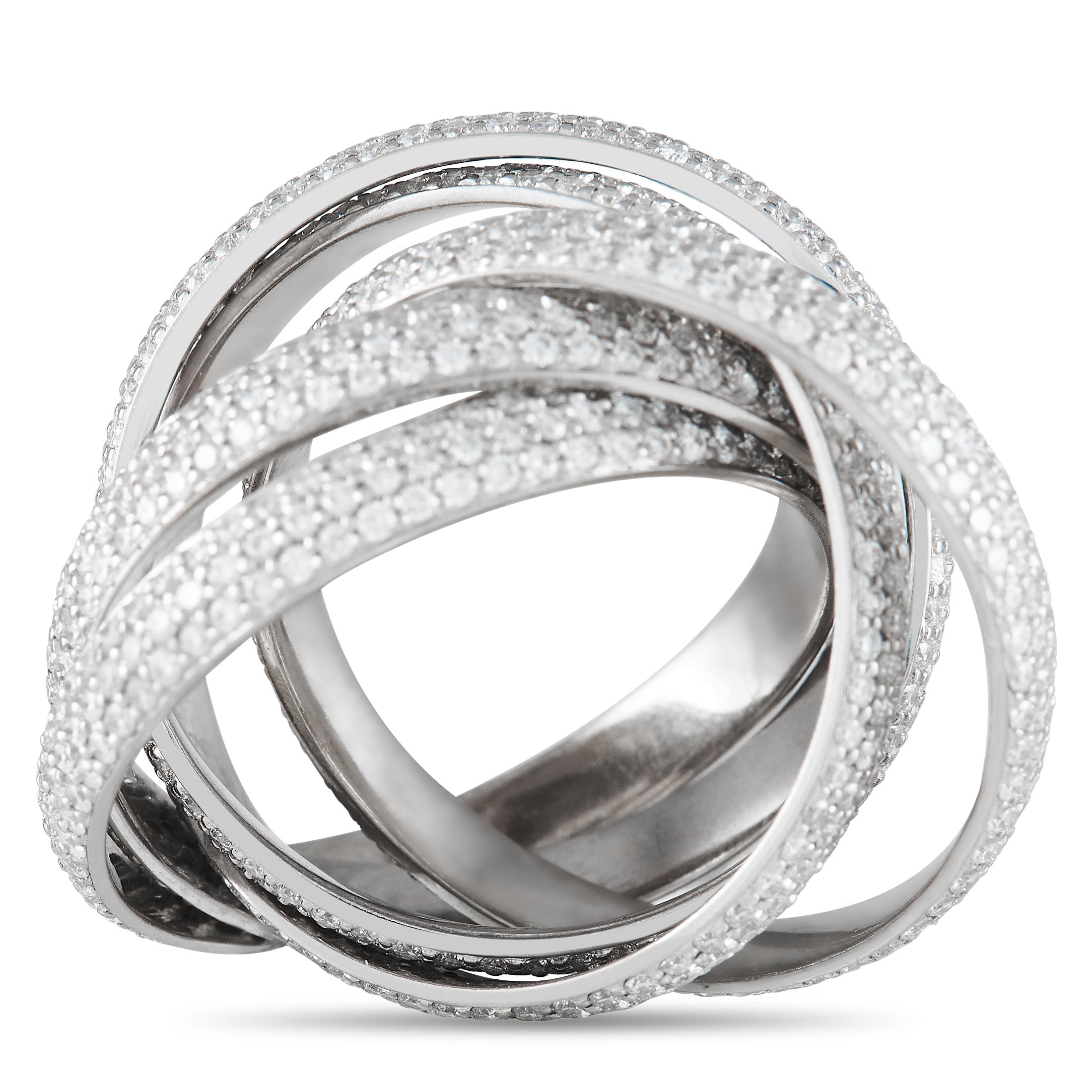 Finely crafted in 18K white gold is this charming ring from Paloma Piccaso's Melody Collection. This sophisticated Tiffany & Co piece features five interlocking bands, with each band traced by rows of round brilliant diamonds. The ring is a