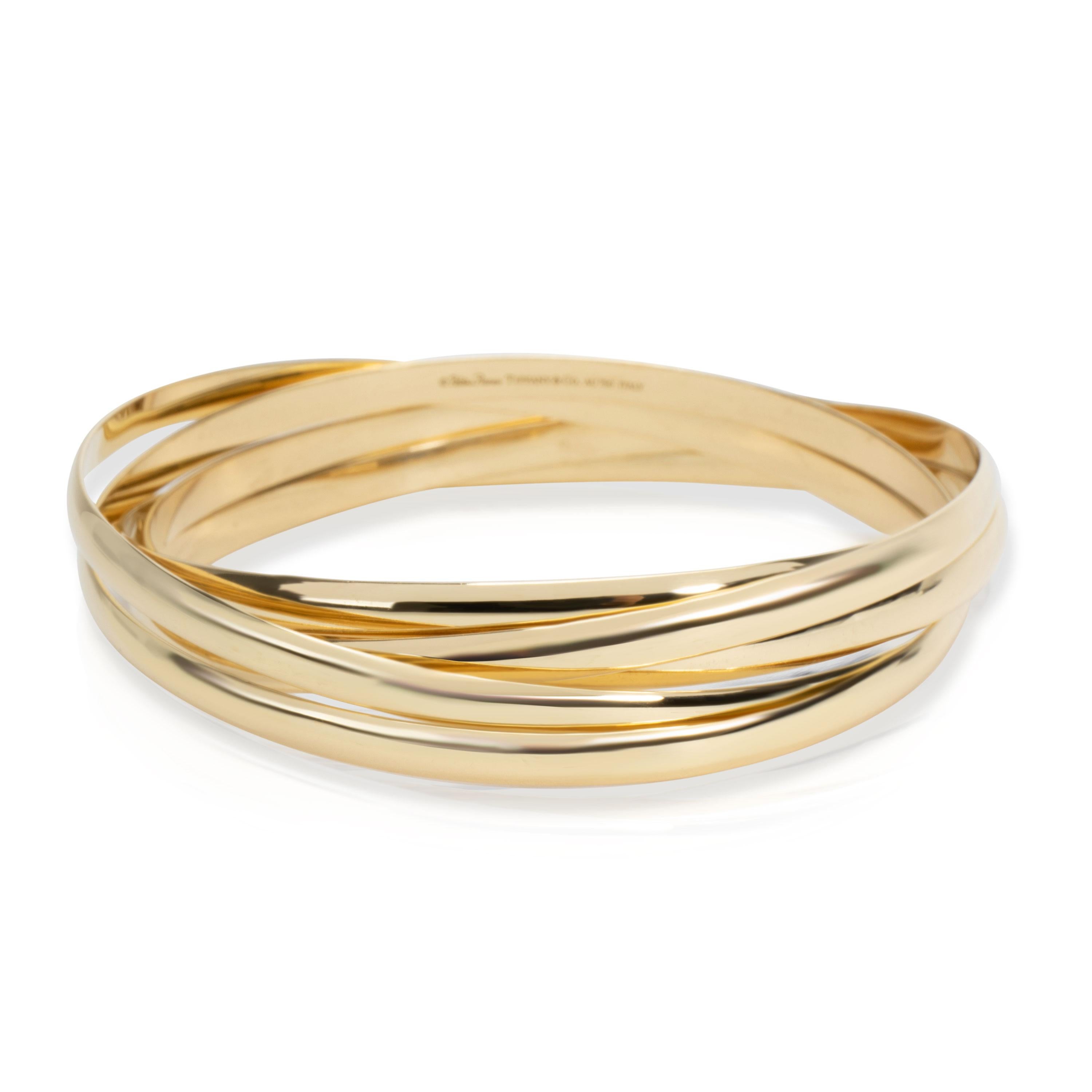 Tiffany & Co. Paloma's Melody Bangle in 18K Yellow Gold

SKU: 105835

Tiffany & Co. Paloma's Melody Bangle in 18K Yellow Gold

Condition Description: Retails for 8000 USD. In excellent condition and recently polished. Fits a 7.25 inch wrist.

Brand: