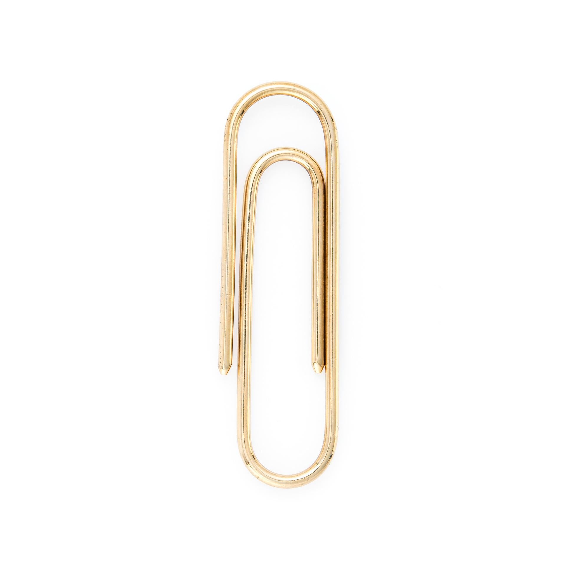 Finely detailed vintage Tiffany & Co paper clip, crafted in 14 karat yellow gold. 

Tiffany is known for making ordinary items into luxury keepsakes. A great item to present to that hard-to-buy-for person in your life. It can also be used as a money