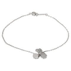 Tiffany & Co. Bracelet en forme de fleur en platine et diamants 0,17 carat