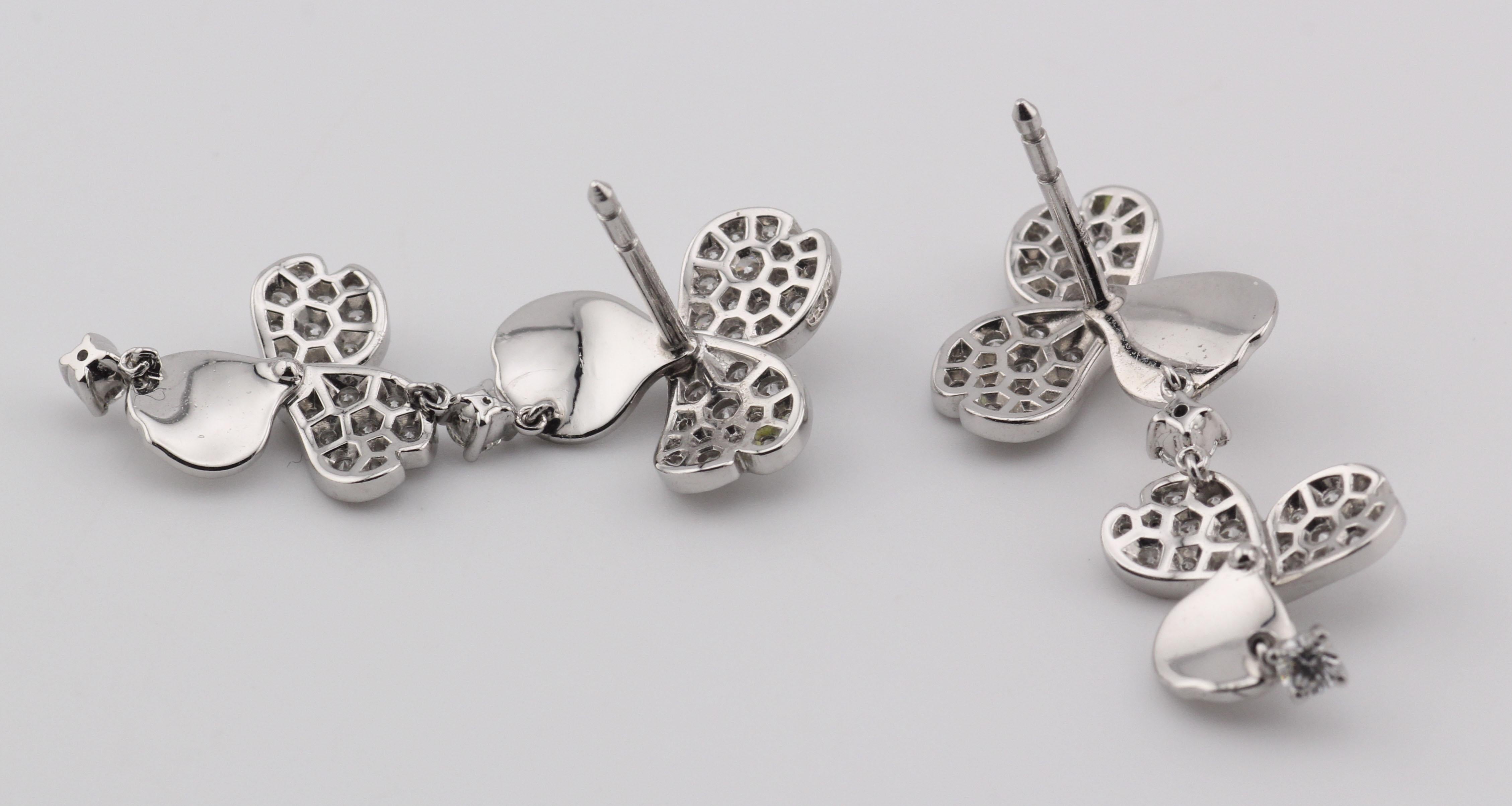 Taglio rotondo Tiffany & Co. Orecchini pendenti in platino con diamanti a fiore di carta in vendita