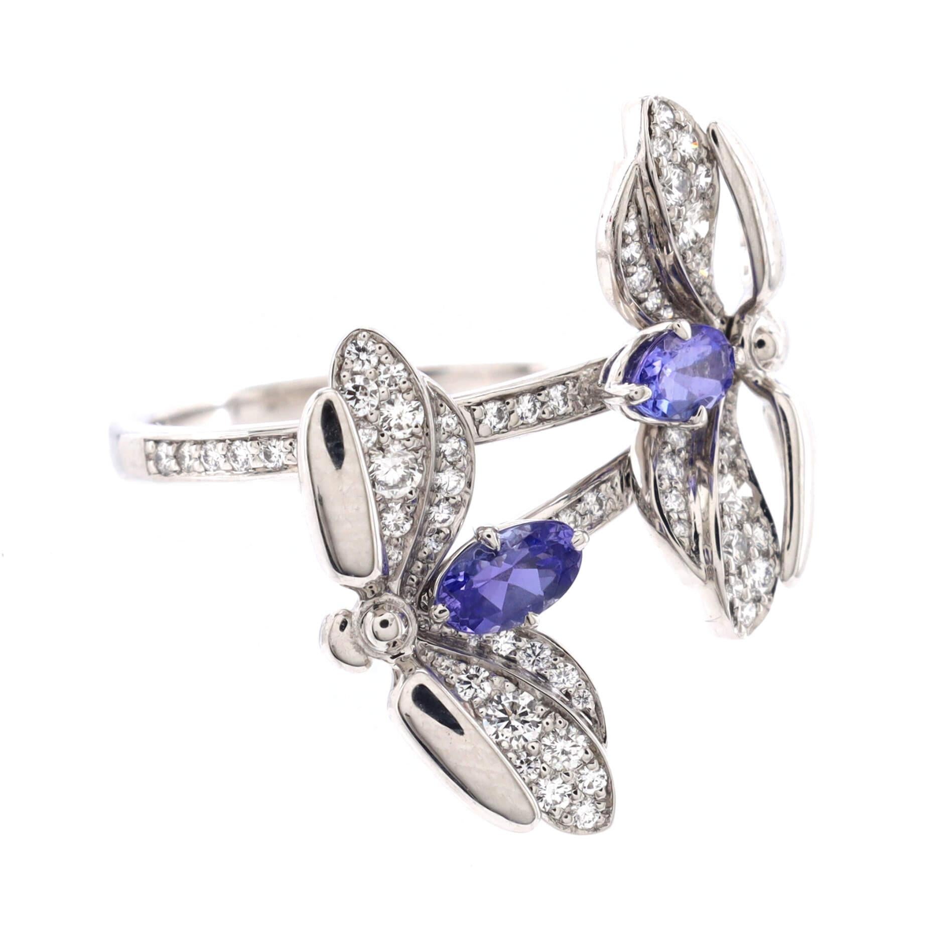 Condition: Great. Minor wear throughout.
Accessories: No Accessories
Measurements: Size: 6, Width: 1.90 mm
Designer: Tiffany & Co.
Model: Paper Flower Double Firefly Ring Platinum with Diamonds and Tanzanites
Exterior Color: Silver
Item Number: