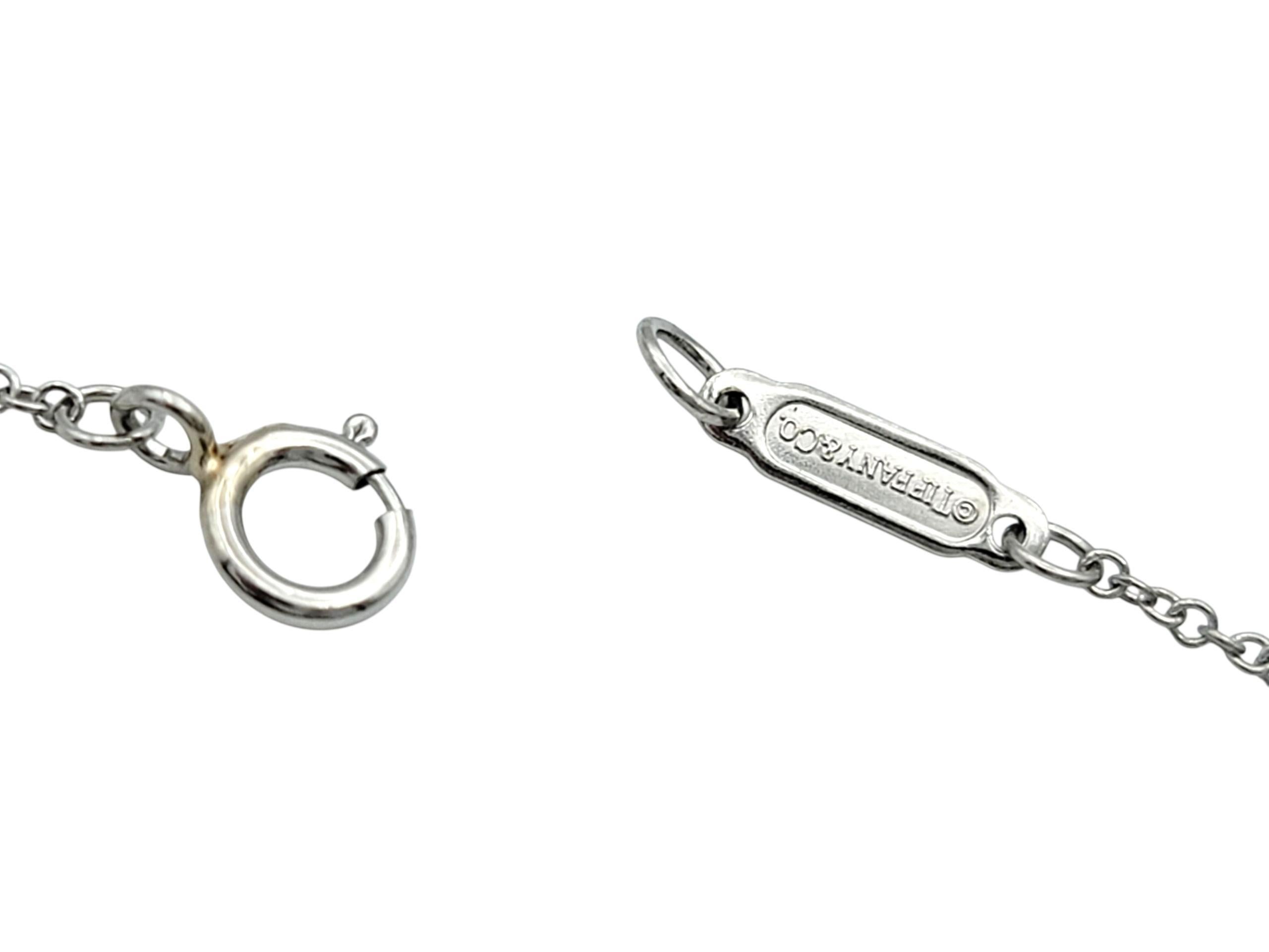 Tiffany & Co. Collana con ciondolo in platino con fiori di carta e diamanti in vendita 1