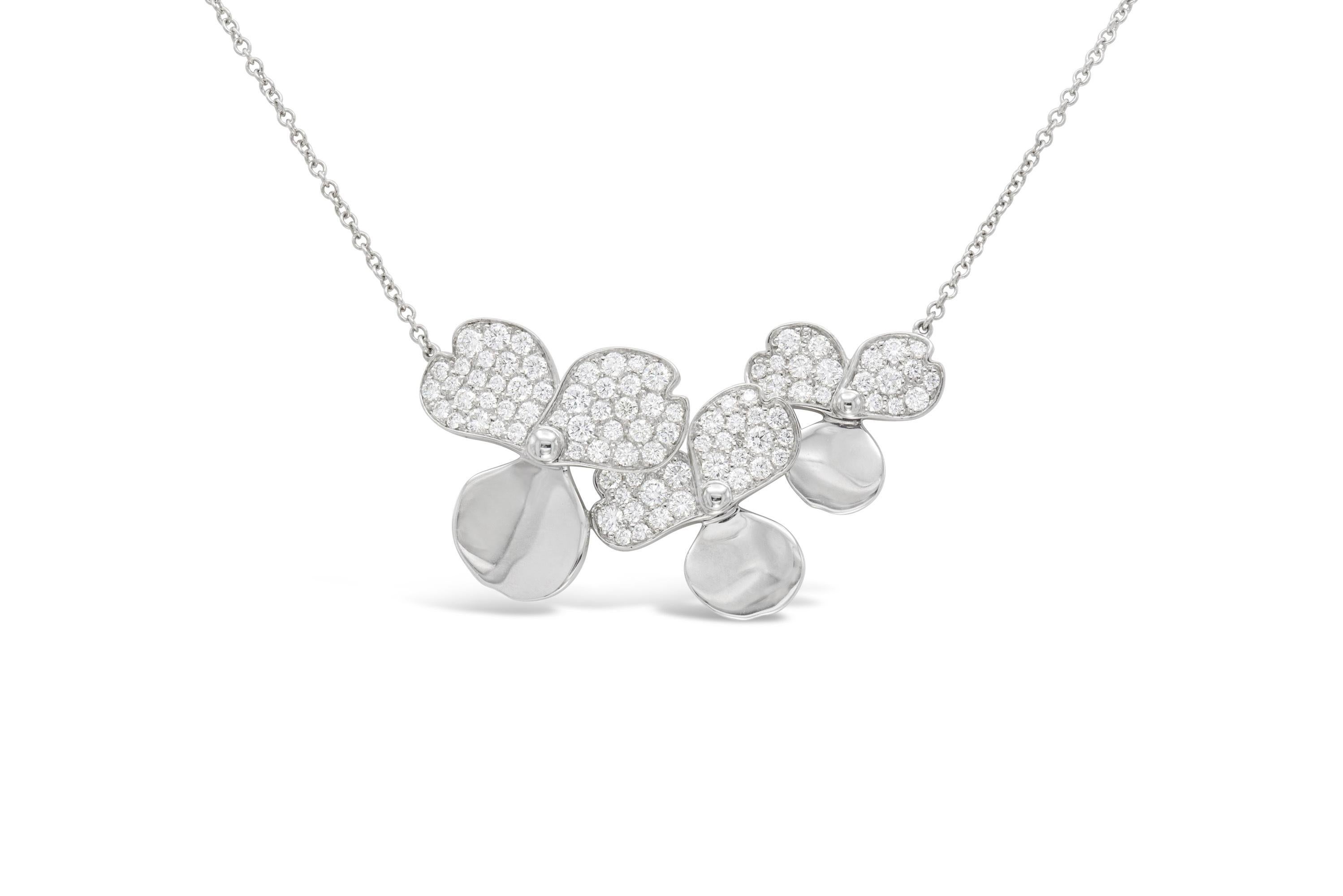 Finely crafted in platinum with round-brilliant cut diamonds weighing 0.78 carat total.
16 inch chain length.
Signed by Tiffany & Co., featured in their 