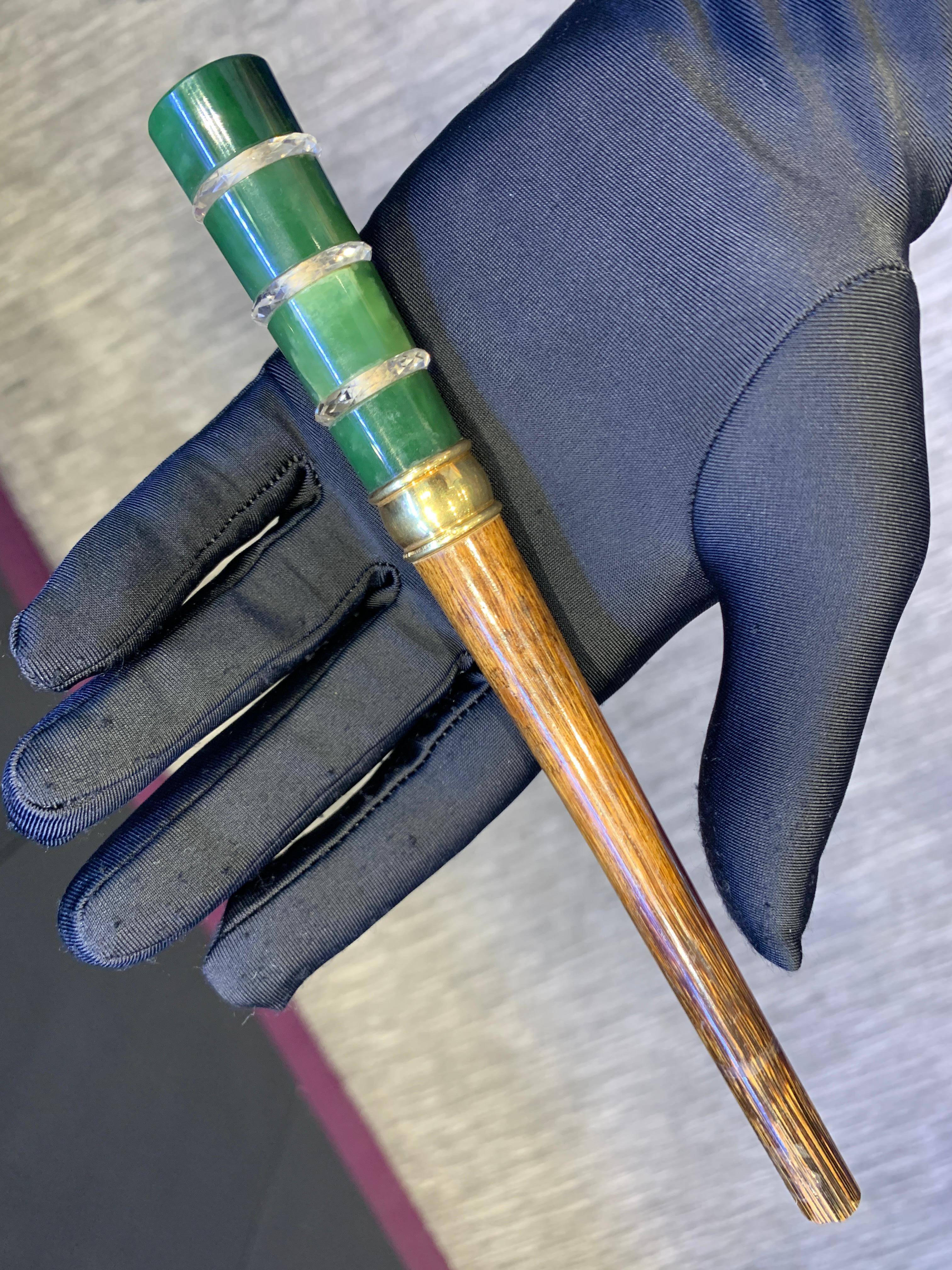 Art Nouveau Tiffany & Co. Parasol Handle

A parasol handle made of 18 karat gold, jade, rocky crystal and wood made circa 1900

Signed Tiffany & Co.
Stamped 18 KT. Gold

Length: 8.5