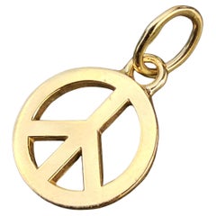 Tiffany & Co. Symbole de paix Pendentif en or jaune 18k avec breloque 4.7g 5/8"