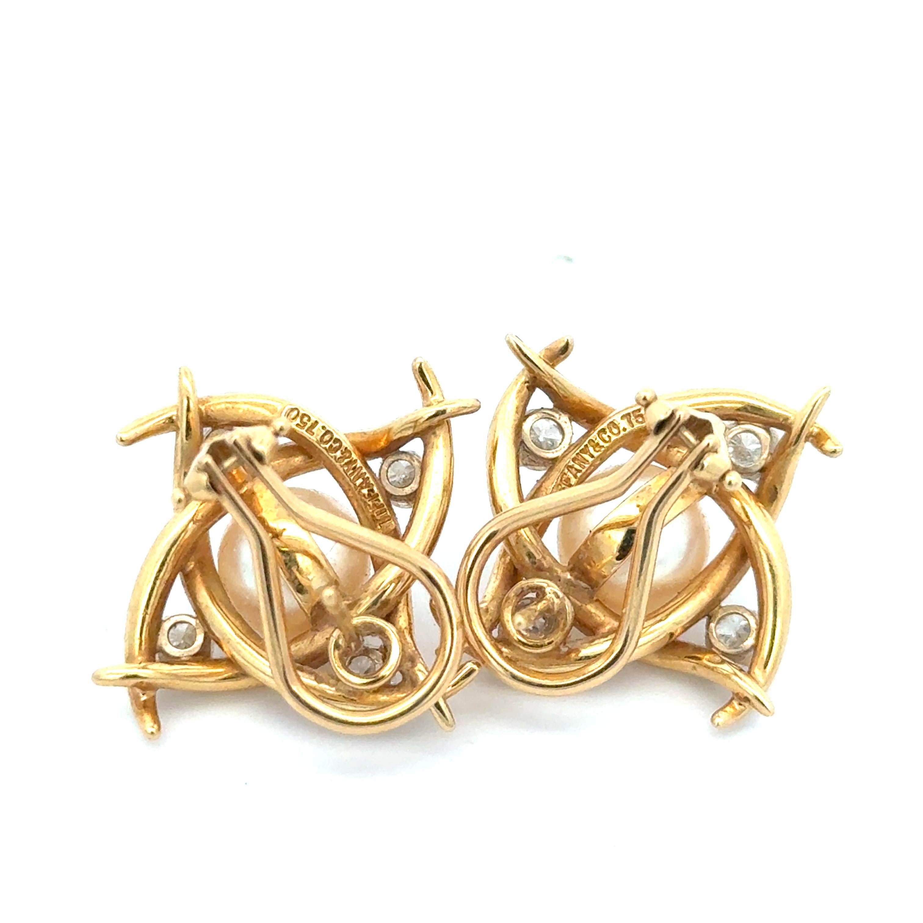 Tiffany & Co. Pearl and Diamond Earrings in 18K Yellow Gold. The earrings approximately measure 1