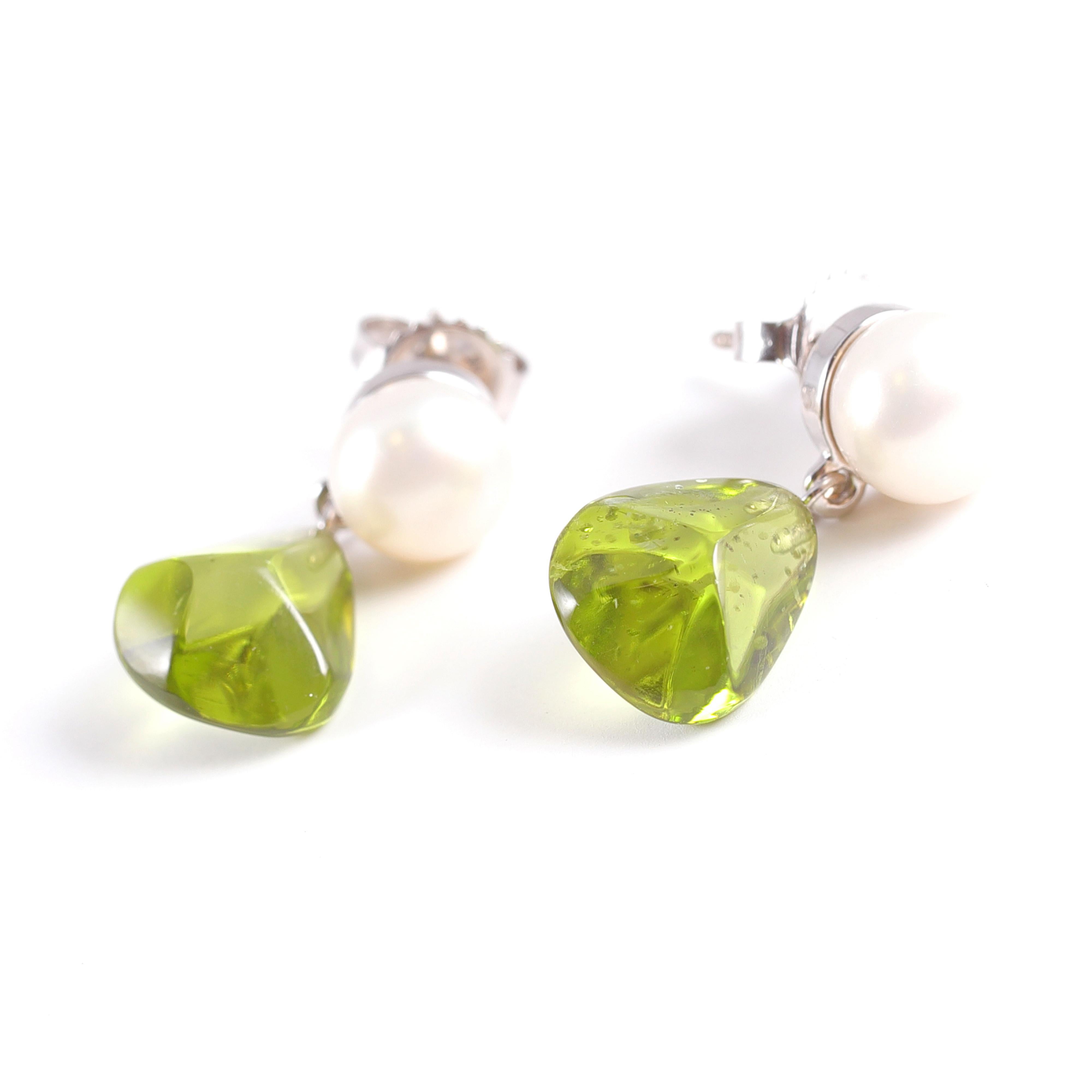 Button freshwater pearls (approximately 7.7-7.8 millimeters) with peridot drops set in 18 karat white gold by Tiffany & Co.
