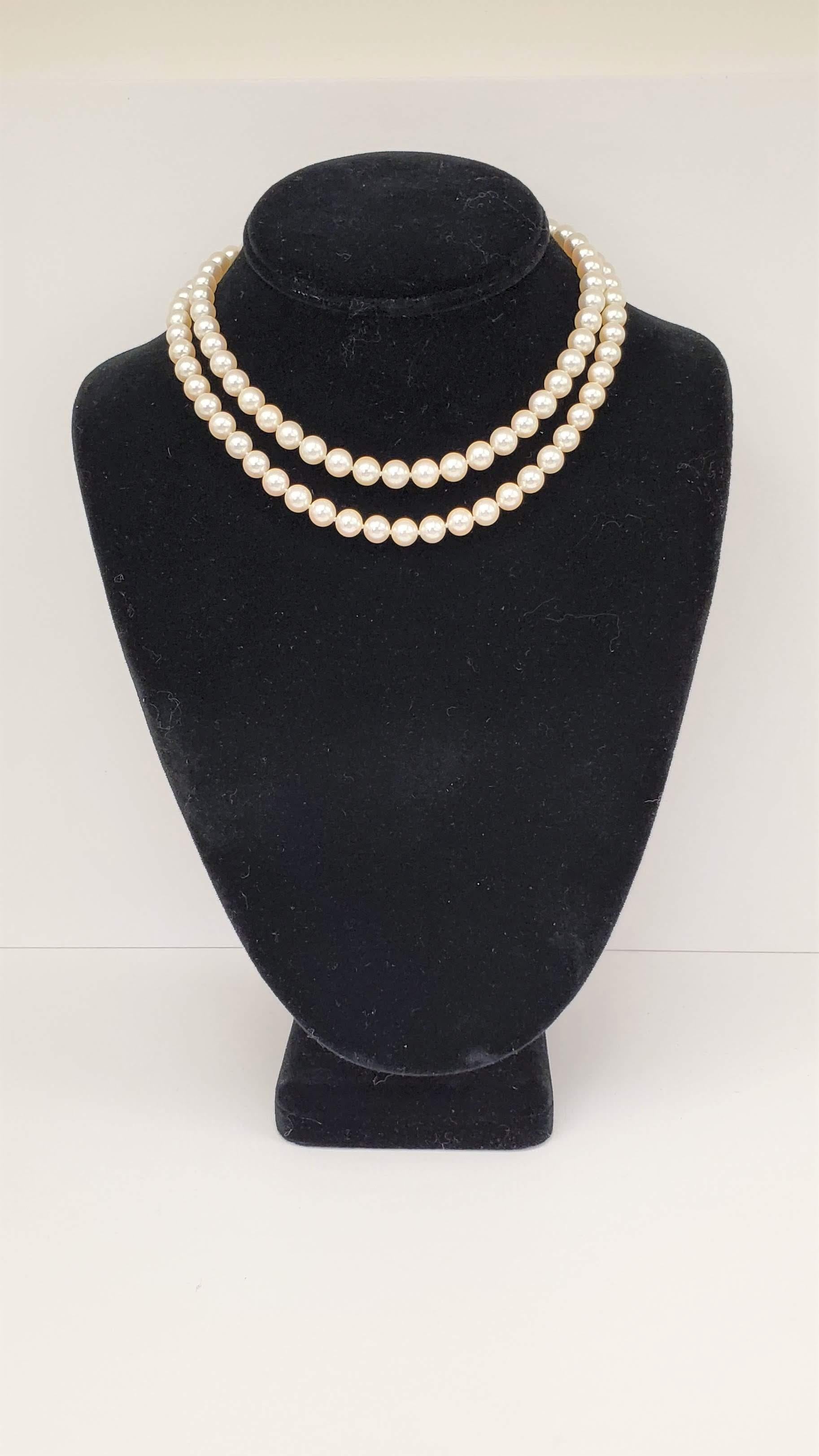 Tiffany & Co. Pearl Necklace with Platinum 'X' Clasp In Excellent Condition In New York, NY