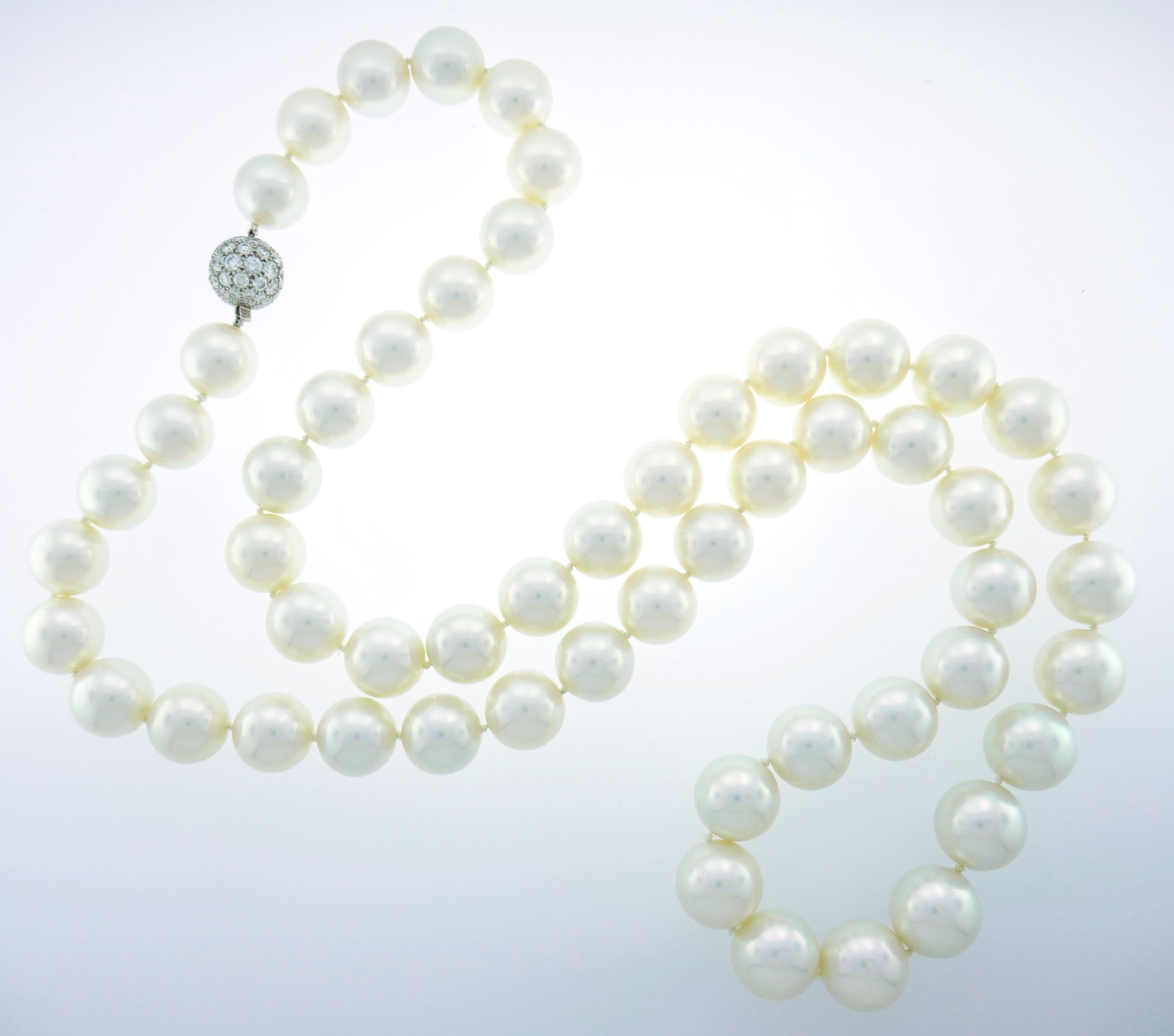 Stunning opera length South Sea pearl strand necklace with a diamond pave clasp created by Tiffany & Co. in 2005. Versatile, classy and timeless! The size and perfect matching of fifty-five pearls graduating from 17.2 mm to 15.2 mm are breathtaking!