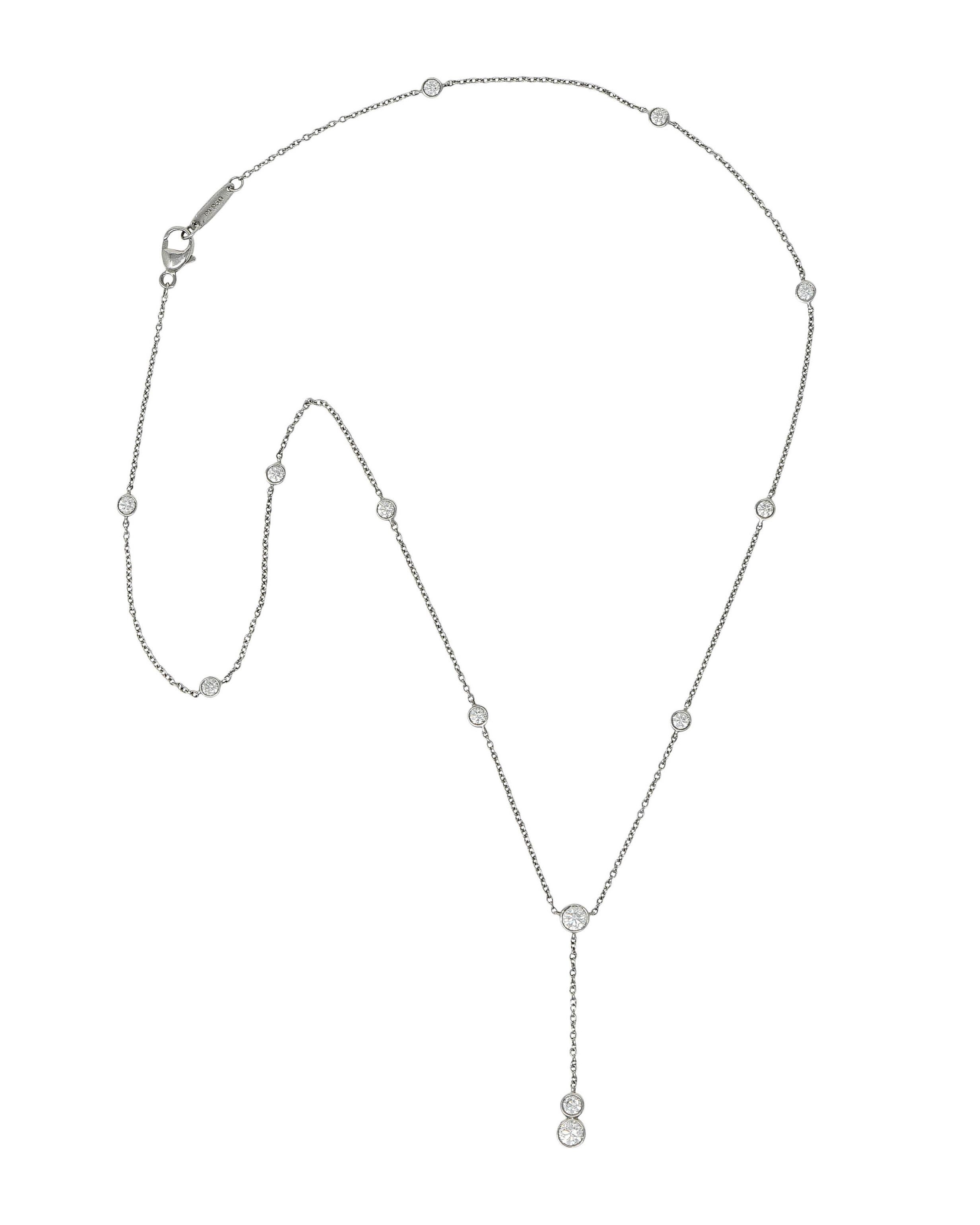 Classic cable chain necklace in a Diamonds-by-the-Yard style with a lariat drop

With bezel set stations throughout featuring round brilliant cut diamonds

Weighing in total approximately 1.00 carat with F/G color and VS clarity

Completed by a