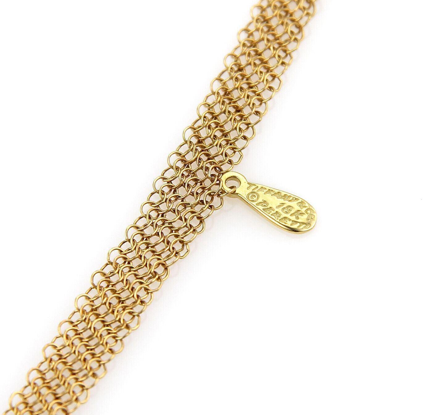 Brand: Tiffany & Co. 
Hallmark: Tiffany & Co. 18k Peretti       
Material: 18k yellow gold
Measurements:  Chain is: 30