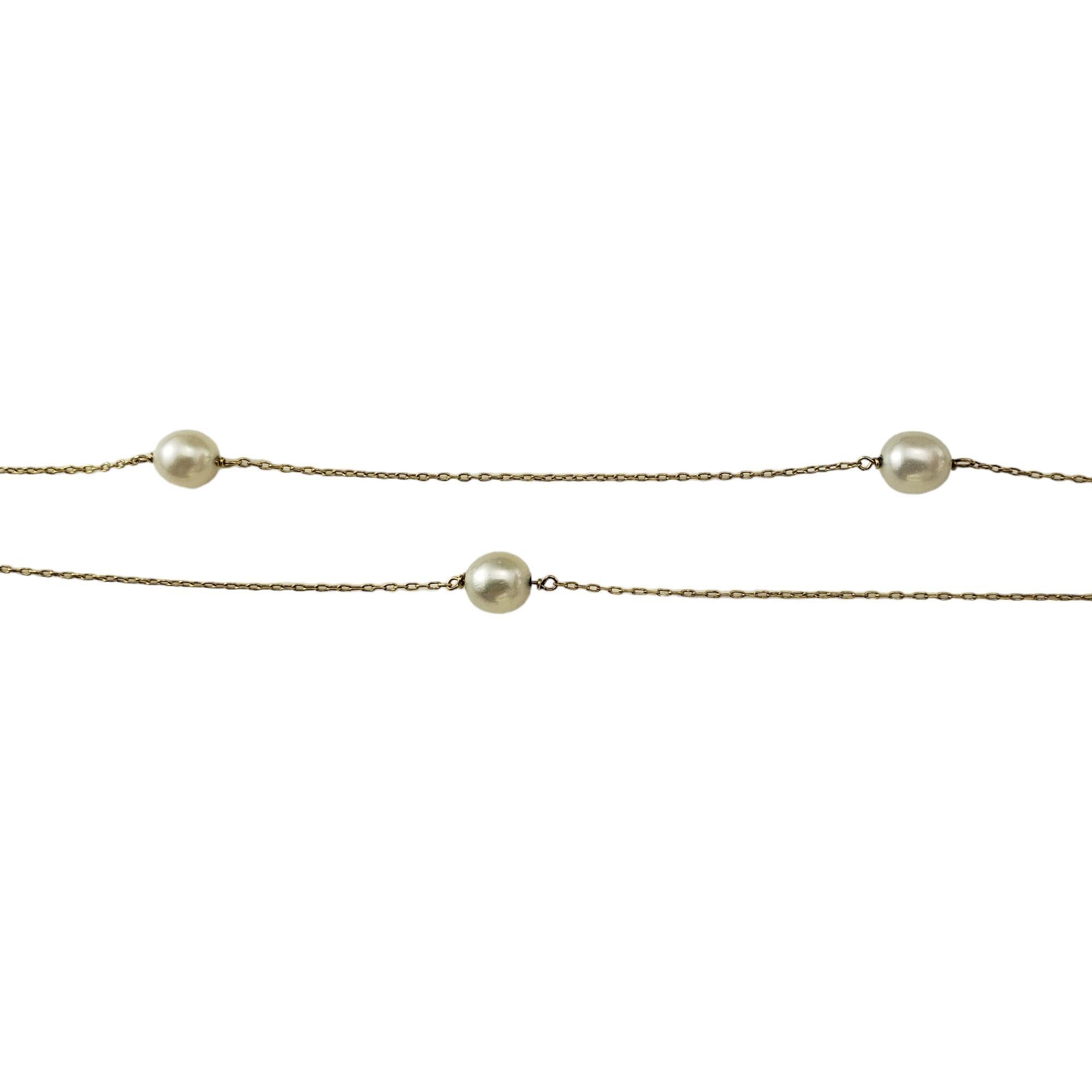 Tiffany & Co. Elsa Peretti 18K Yellow Gold Pearls by the Yard Necklace

This stunning station necklace features 14 white freshwater pearls (7-7.5 mm each) set on a delicate 18K yellow gold necklace.  By Elsa Peretti for Tiffany & Co. 

Size: 45