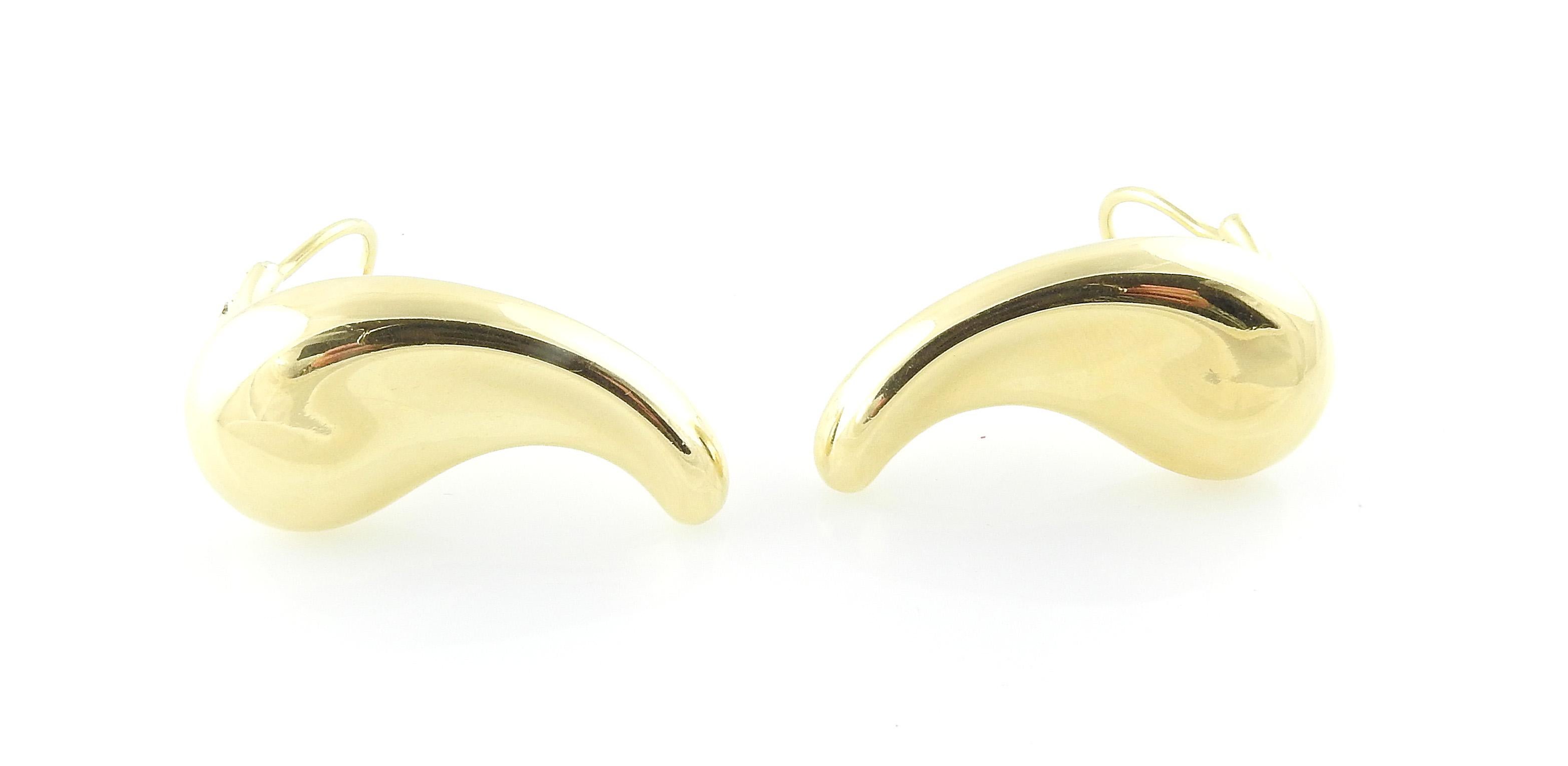 Tiffany & Co. Peretti X Große Bohnen-Ohrringe

Die Bohne ist ein klassisches Design von Elsa Peretti. Diese Bohnenohrringe haben die Größe X Large und sind für Clip-Ohrringe / nicht gepiercte Ohren gedacht. 

Die Ohrringe sind in 18 Karat Gelbgold