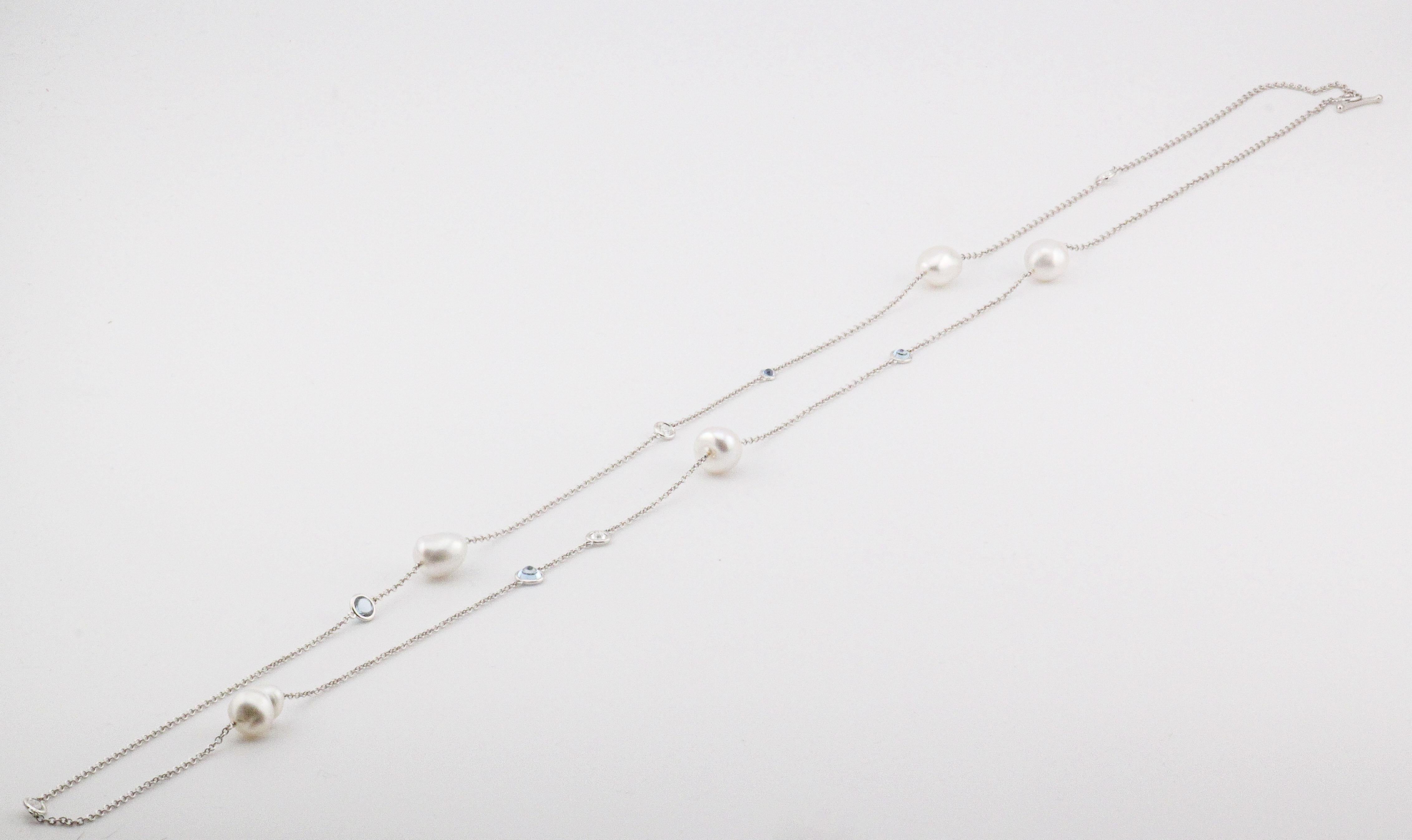 Immerse yourself in the ethereal beauty of the Tiffany & Co. Elsa Peretti Aquamarine, Pearl, and Diamond Platinum Sprinkle by the Yard Necklace. A harmonious blend of timeless elegance and modern design, this masterpiece exemplifies Elsa Peretti’s