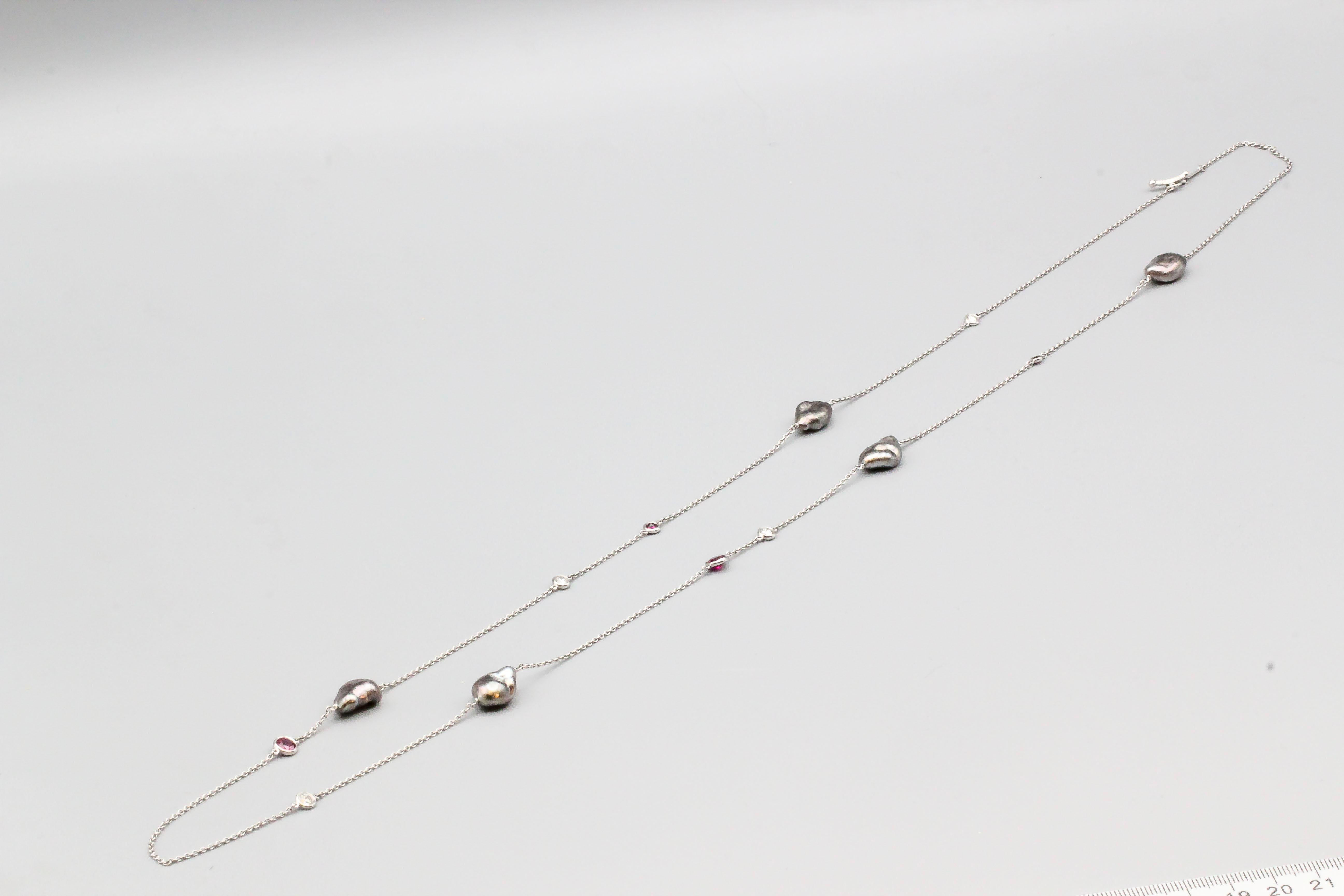 Elegant Tahitian Keshi pearl, diamond, ruby and platinum necklace from the 