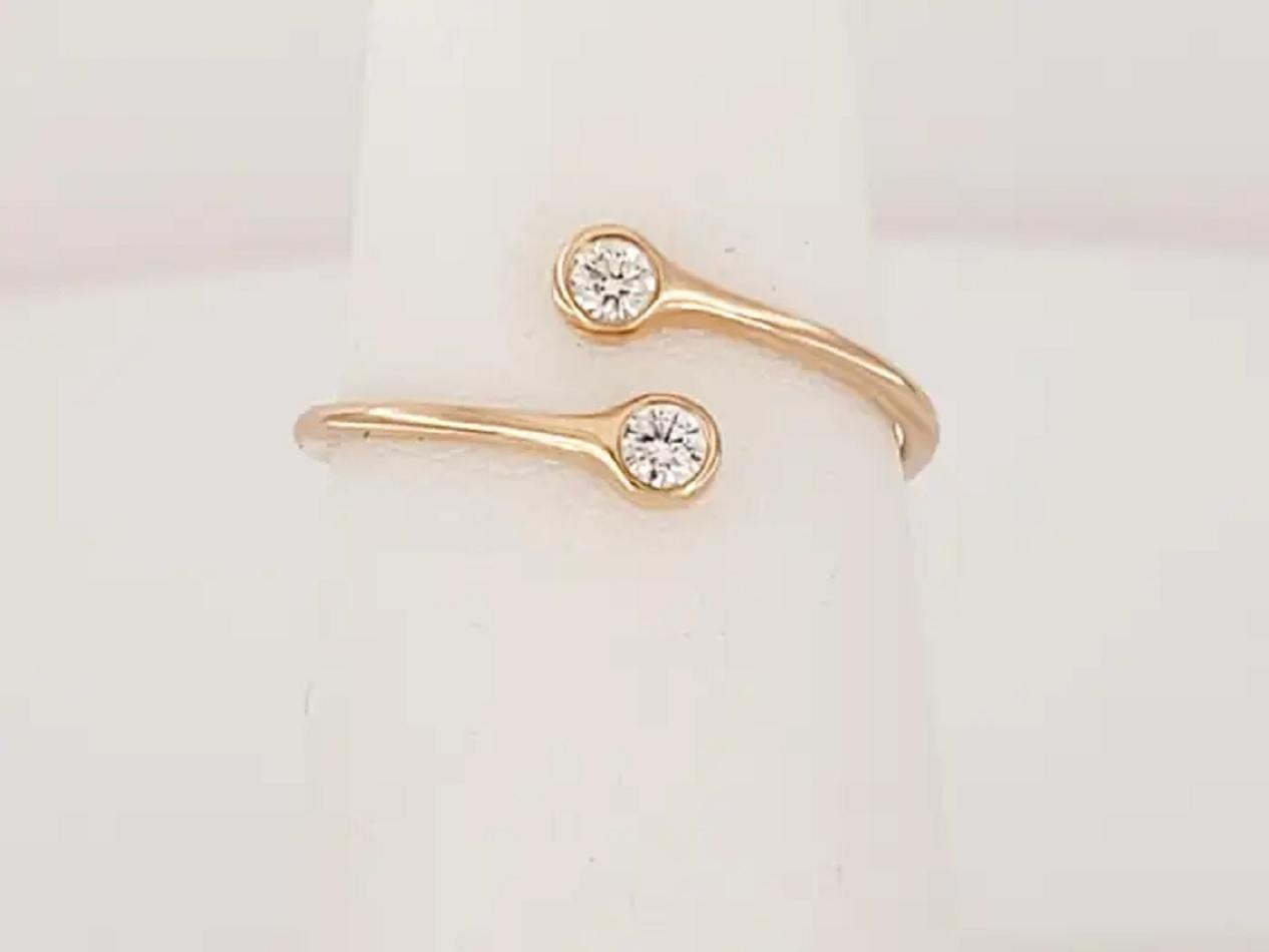 Brand: Elsa Peretti for Tiffany & Co
Diamond Hoop Ring
Round Diamonds: .10ctw
Diamond Clarity: VS
Color Grade F-G
Material 18K Rose Gold
Ring Size 7
Condition New
Comes with Tiffany Ring Box