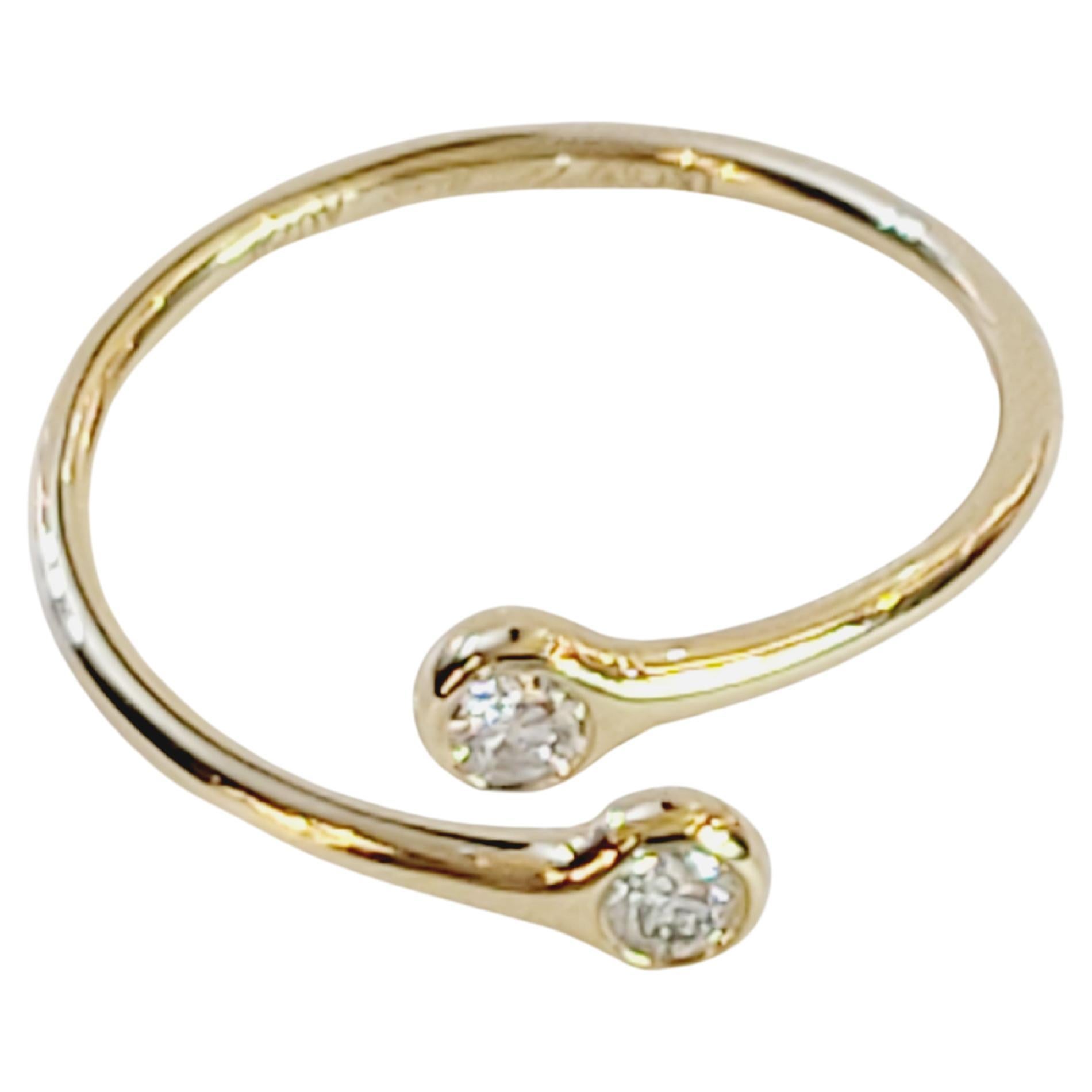 Tiffany & co, bague anneau bypass peretti en or jaune 18 carats avec diamants