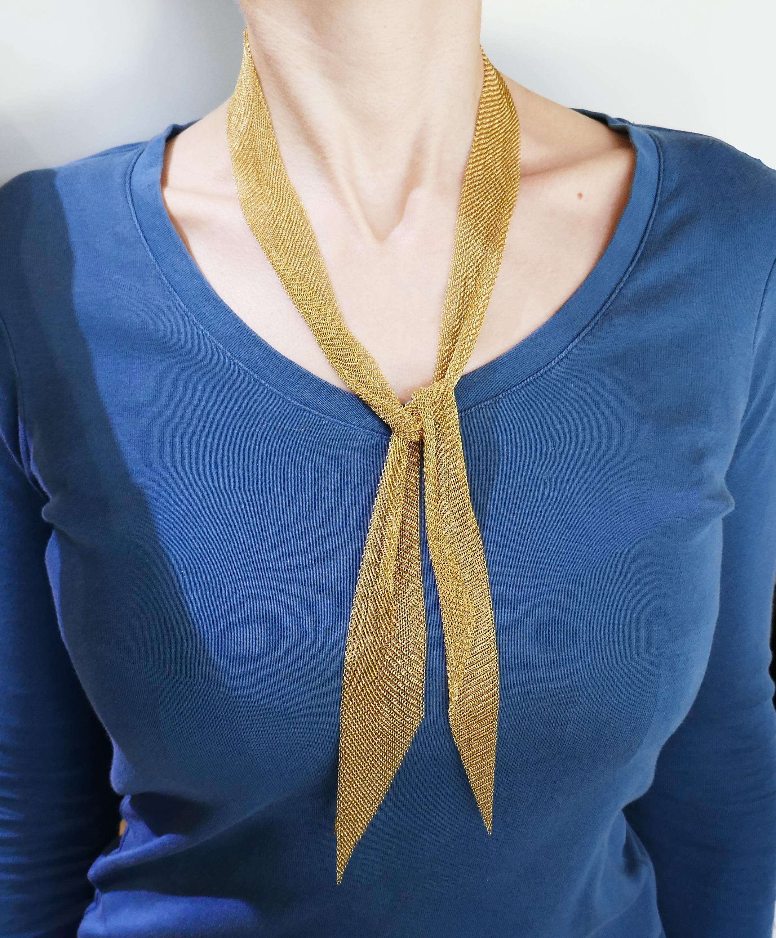 Signature mesh scarf necklace created by Elsa Peretti for Tiffany & Co. Elegant, smooth and wearable, the necklace is a great addition to your jewelry collection. 
The necklace is made of 18 karat yellow gold. 
It measures 37.5 x 2 inches (95 x 5