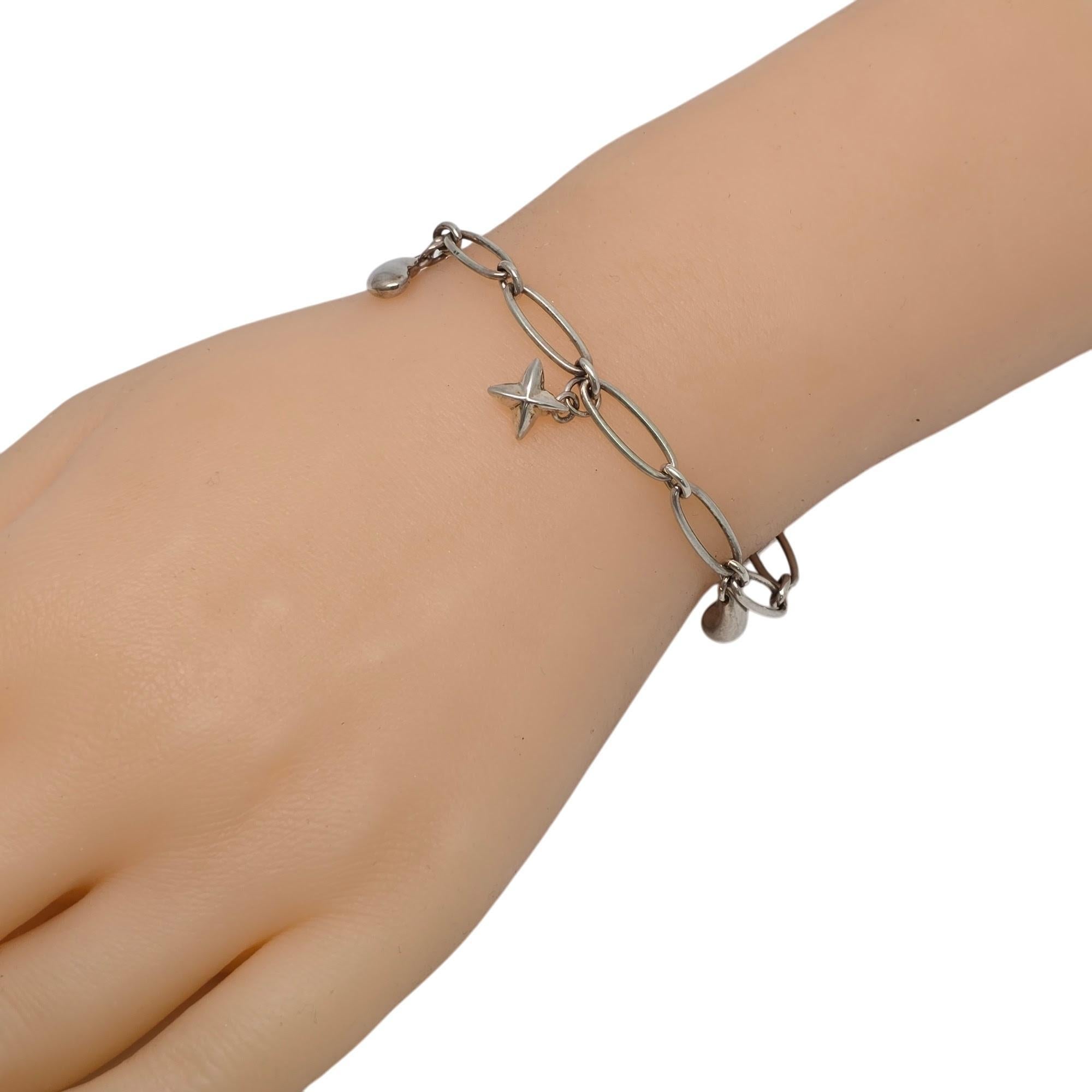Tiffany & Co Peretti Sterling Silver Charm Bracelet Heart Bean Dove Star #20138 For Sale 6