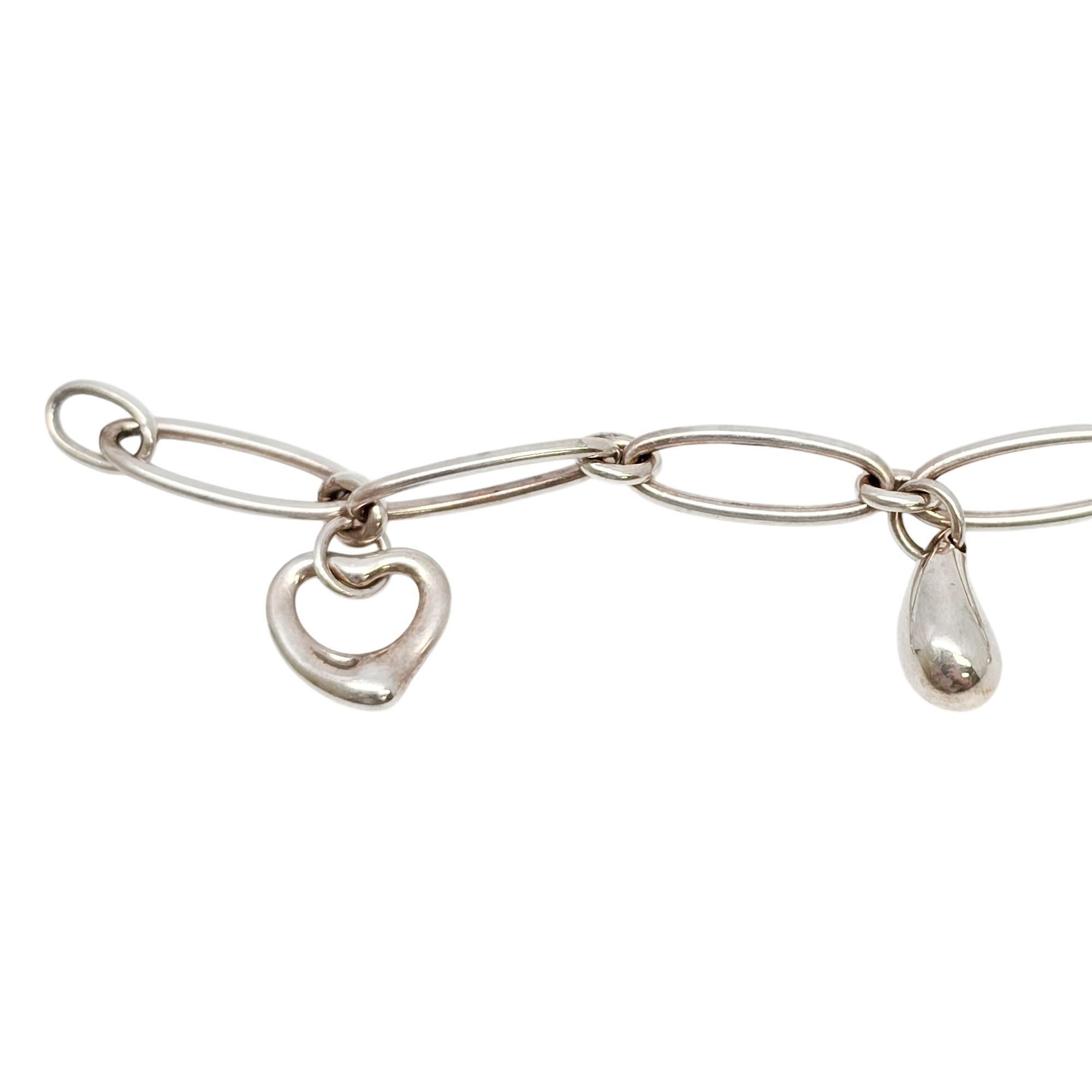 Tiffany & Co Peretti Sterling Silver Charm Bracelet Heart Bean Dove Star #20138 In Good Condition For Sale In Washington Depot, CT