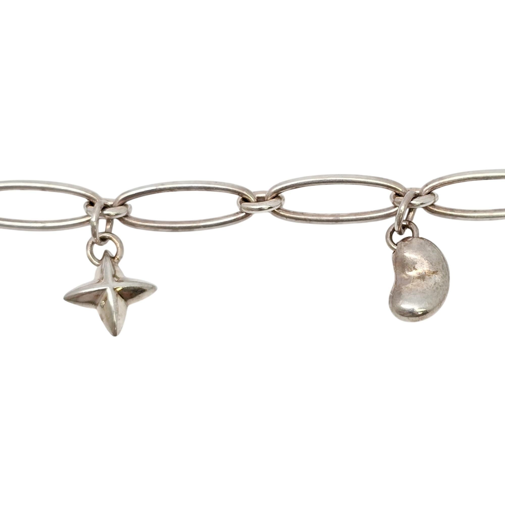 Women's Tiffany & Co Peretti Sterling Silver Charm Bracelet Heart Bean Dove Star #20138 For Sale