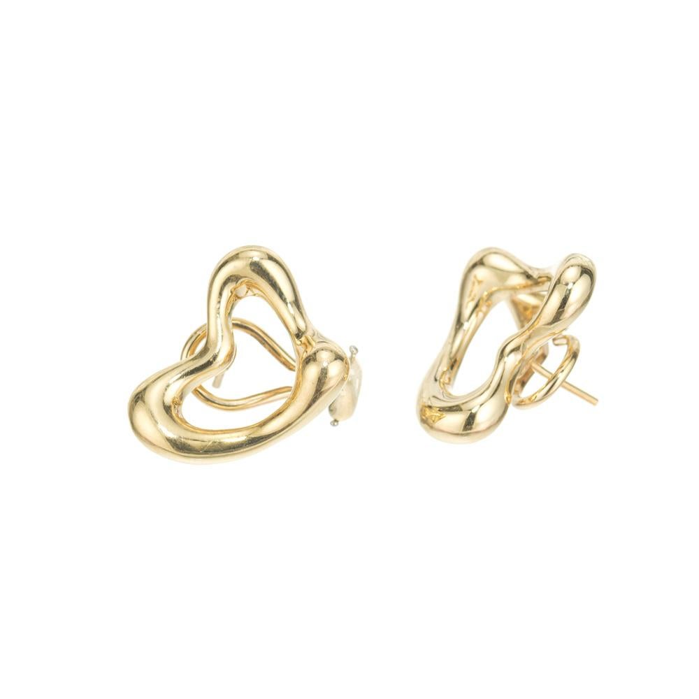 Tiffany & Co Elsa Peretti schwere massive 18k Gelbgold Clip Post offene Herz Ohrringe.  Nicht mehr in Produktion.

18k Gelbgold
Gestempelt: 750 Tiffany & Co Peretti.
16,9 Gramm.
13/16 x 7/8 Zoll.
