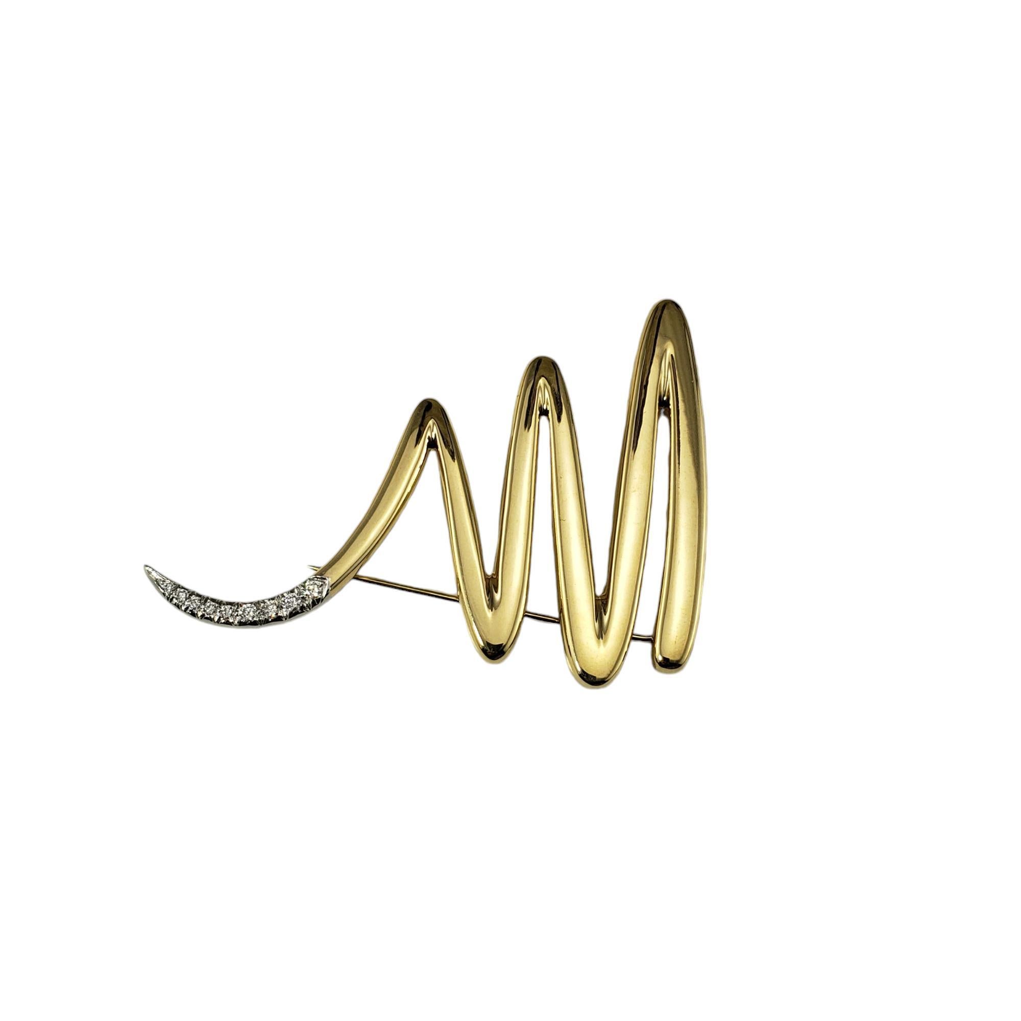 Tiffany & Co. Paloma Picasso 18K Yellow Gold Platinum and Diamond Zig Zag Brooch/Pin-

This elegant zig zag brooch features nine round brilliant cut diamonds set in beautifully detailed platinum and 18K yellow gold.  By Paloma Picasso for Tiffany &