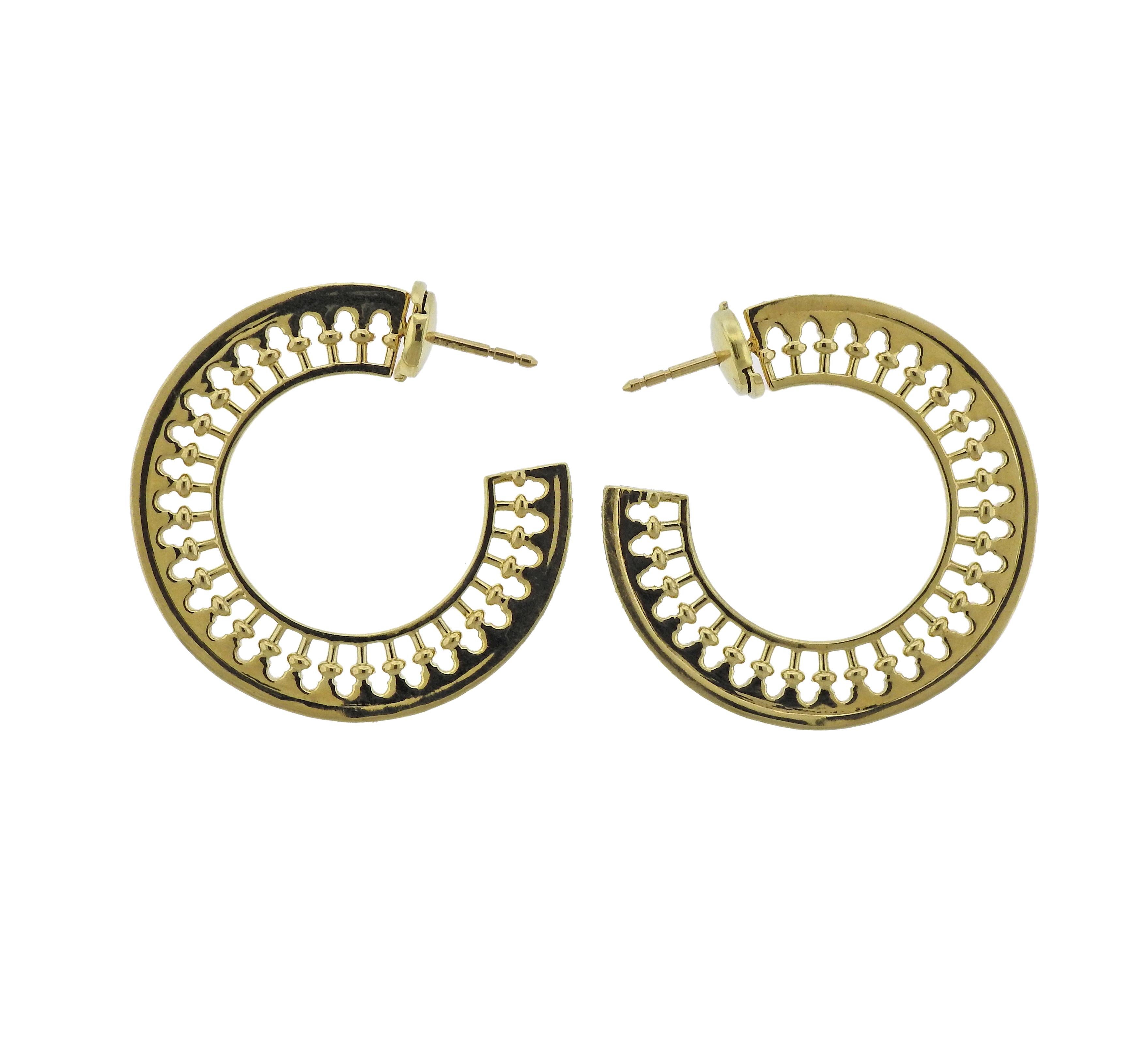 Pair of 18k gold hoop earrings by Paloma Picasso, crafted for Venezia Stella collection Tiffany & Co. Set with approx. 1.17ctw in diamonds. Earrings are 35mm in diameter , weigh 17 grams. Marked Tiffany & Co, Paloma Picasso, 750.
