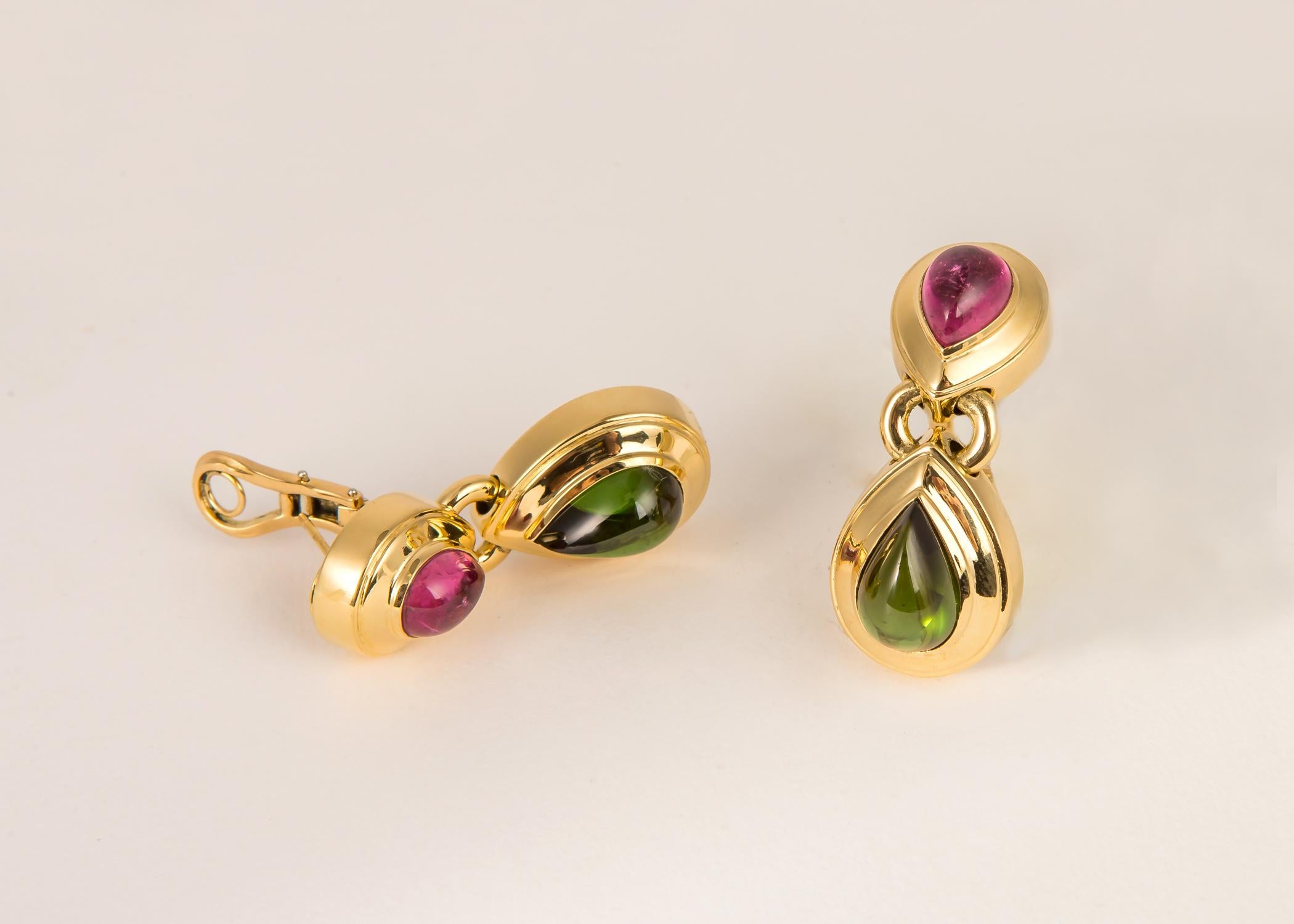 This is simply a classic. Tiffany & Co. combines soft pink and rich green tourmaline and sets them in wide elegant gold frames. This is a day to evening earring. 1 3/4 inches in length.
