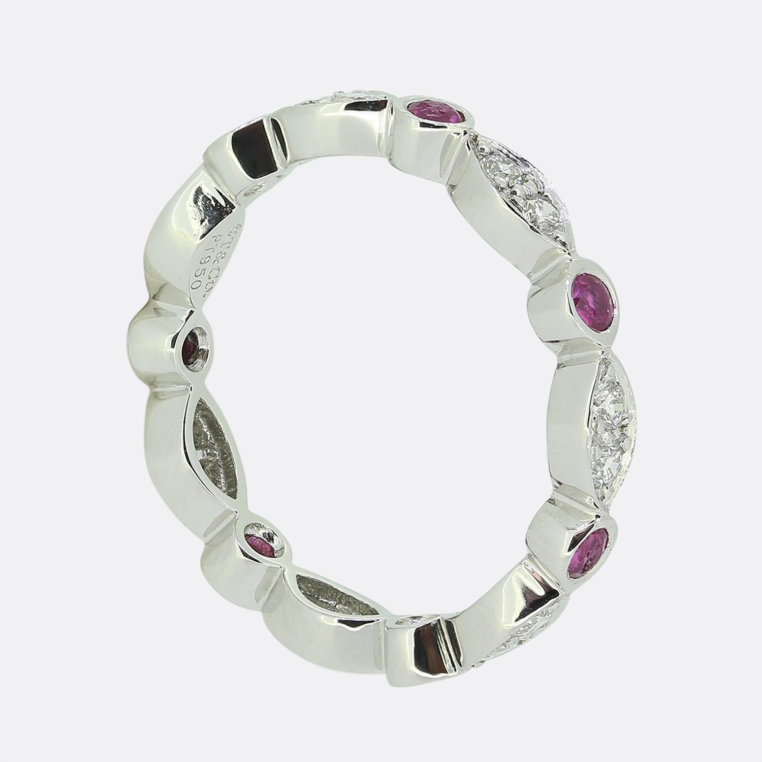 Here we have an iconic eternity ring from the world renowned luxury jewellery designer, Tiffany & Co. This piece forms part of their Jazz collection and showcases an alternating sequence of pink sapphires and paired round brilliant cut