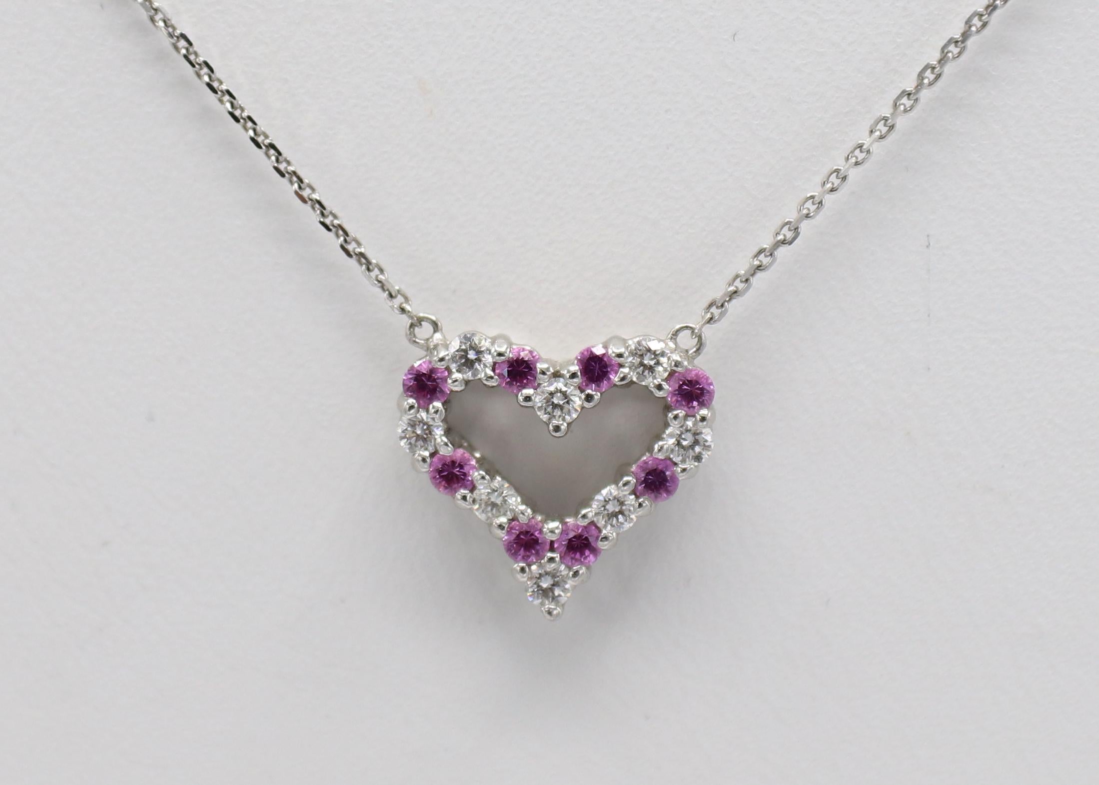Tiffany & Co. Pink Sapphire & Diamond Sentimental Open Heart Pendant Necklace 
Metal: Platinum & 14k white gold (chain not Tiffany) 
Weight: 2.79 grams
Heart: 11.5 x 11mm
Length: 16 inches
Diamonds: Approx. .16 CTW G VS
