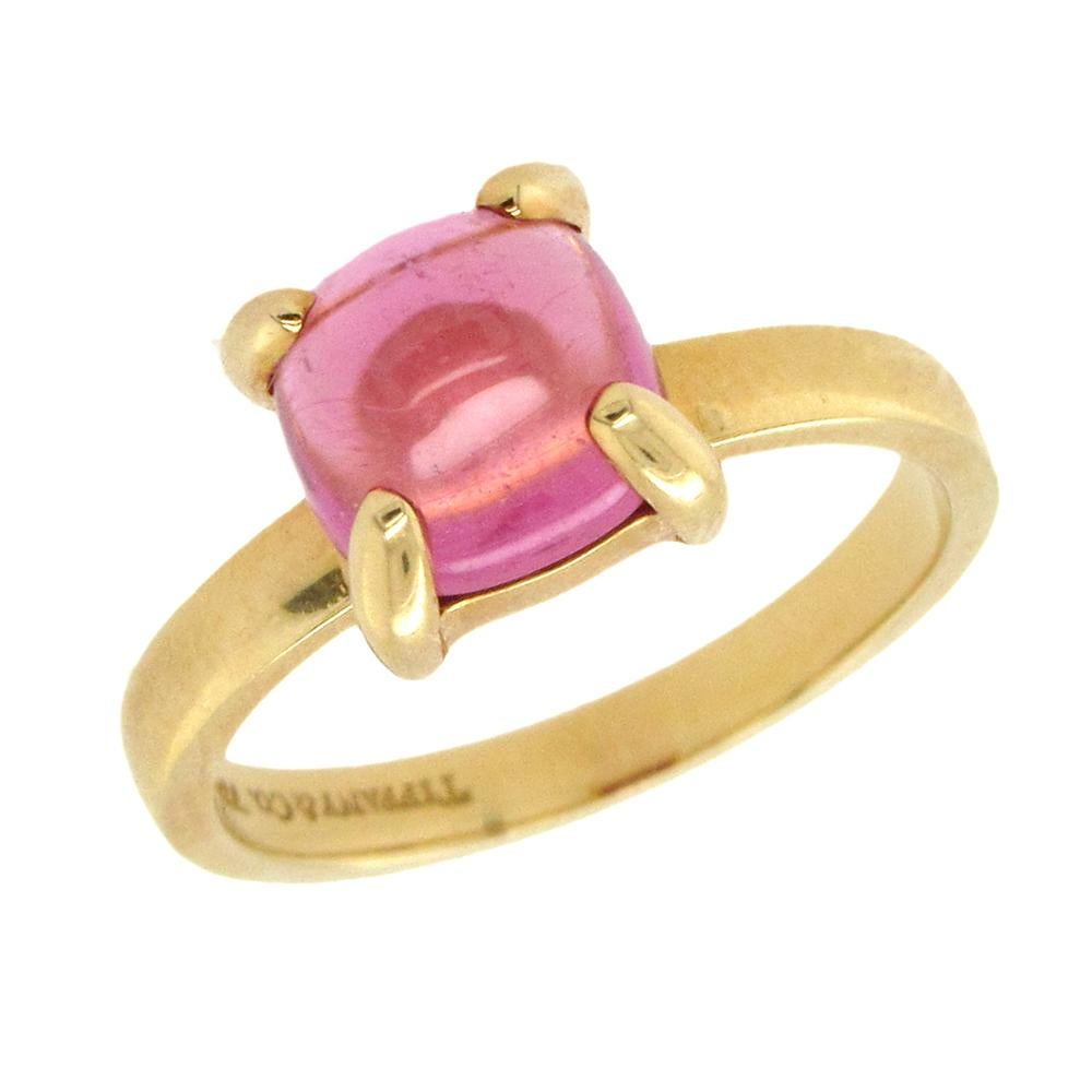 18K yellow gold and sugarloaf pink tourmaline cabochon ring by Tiffany & Co from Paloma Picasso, circa 1990’s. From a private estate, size 5, measures 1/4″ x 1/4″ x 1/4″.