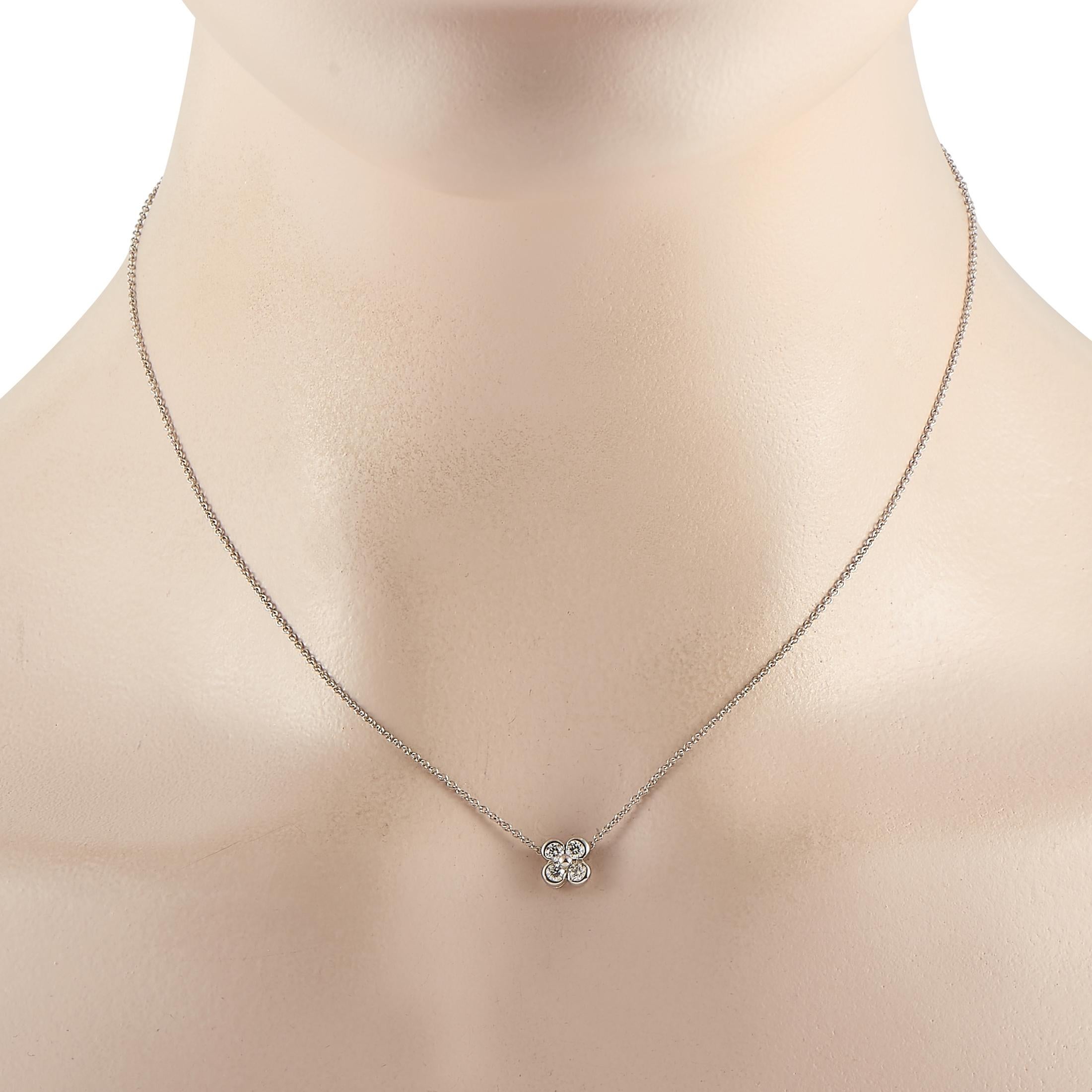This Tiffany & Co. necklace is made of platinum and embellished with diamonds that amount to 0.20 carats. The necklace weighs 3.5 grams and boasts a 16” chain and a pendant that measures 0.25” in length and 0.25” in width.
 
 Offered in estate
