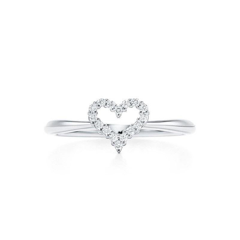 TIFFANY & Co. Platinum .06ct Diamond Heart Ring 5

Metal: Platinum
Size: 5
Diamond: Round brilliant diamonds, carat total weight .06 
Hallmark: ©TIFFANY&CO. Pt950
Condition: Excellent condition, like new 

Limited edition, no longer available for