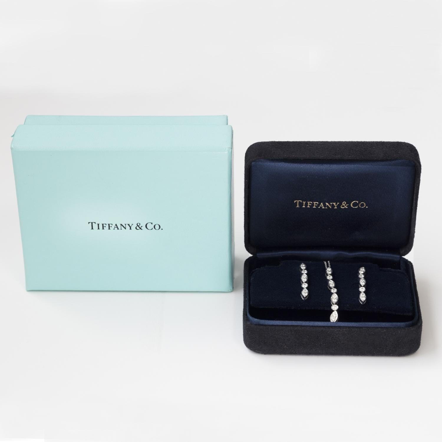 Tiffany & Co Platinum 0.85ct Diamond Earring & Necklace Jewellery Set 

Elevate your elegance with this stunning Tiffany Platinum and Diamond Earring & Necklace Set, a symbol of timeless sophistication and luxury. Masterfully crafted in London in