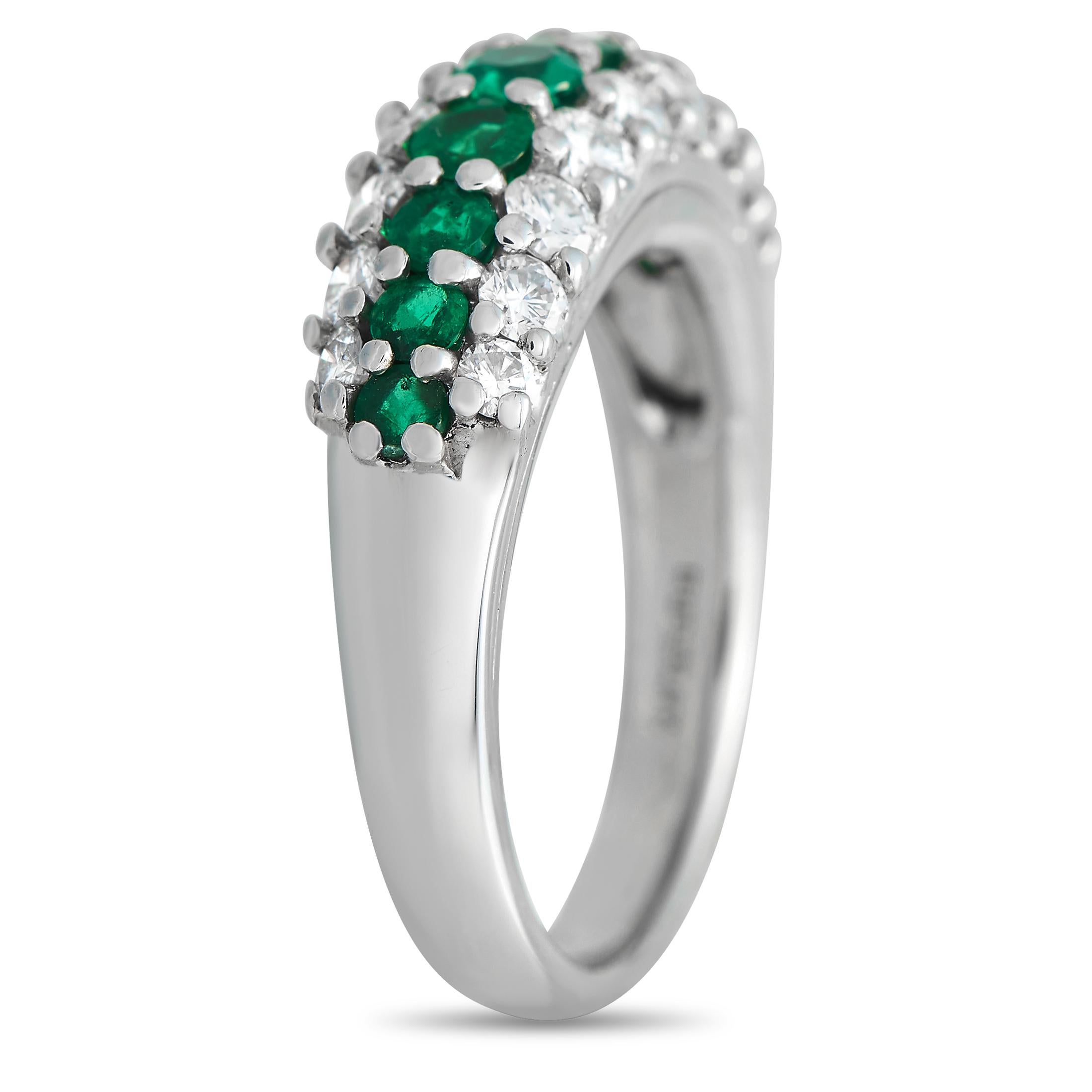 Here is a gorgeous ring ready to bring the perfect amount of color and shine to your elegant looks. This Tiffany & Co. piece has a polished band crafted in solid platinum. It comes embellished with a row of emerald gemstones in tapering sizes, set