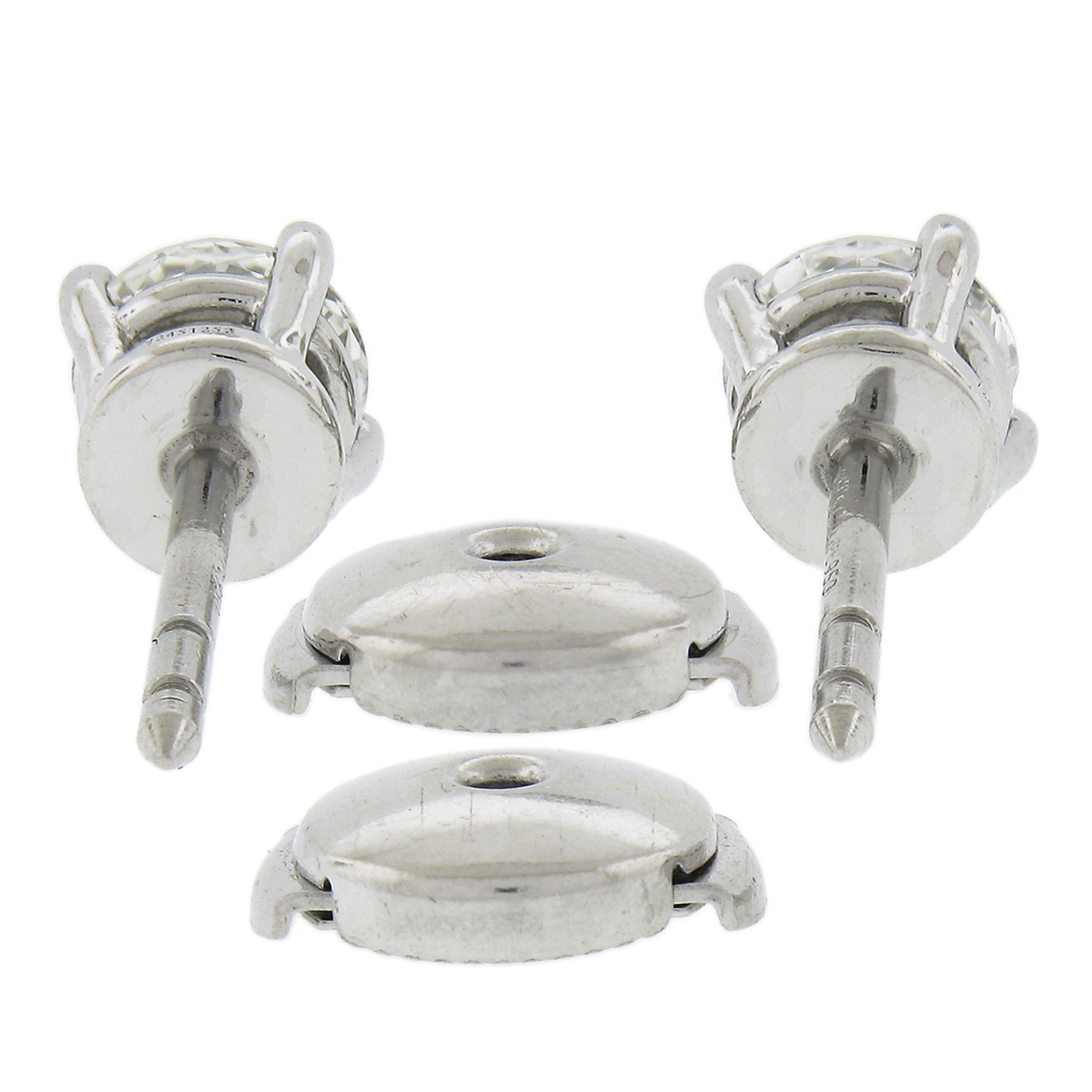 --Stone(s):--
(2) Natural Genuine Diamonds - Round Brilliant Cut - 4-Prong Set - G/H Color - VVS-VS Clarity - 5.1mm 
Total Carat Weight:	1.0 (approx.)

Material: Solid .950 Platinum 
Weight: 3.37 Grams
Backing: Post Backs w/ La Pousette Closures