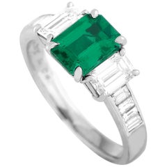 Tiffany 
Co. Platinum 1.25 Carat Diamond and Emerald Ring