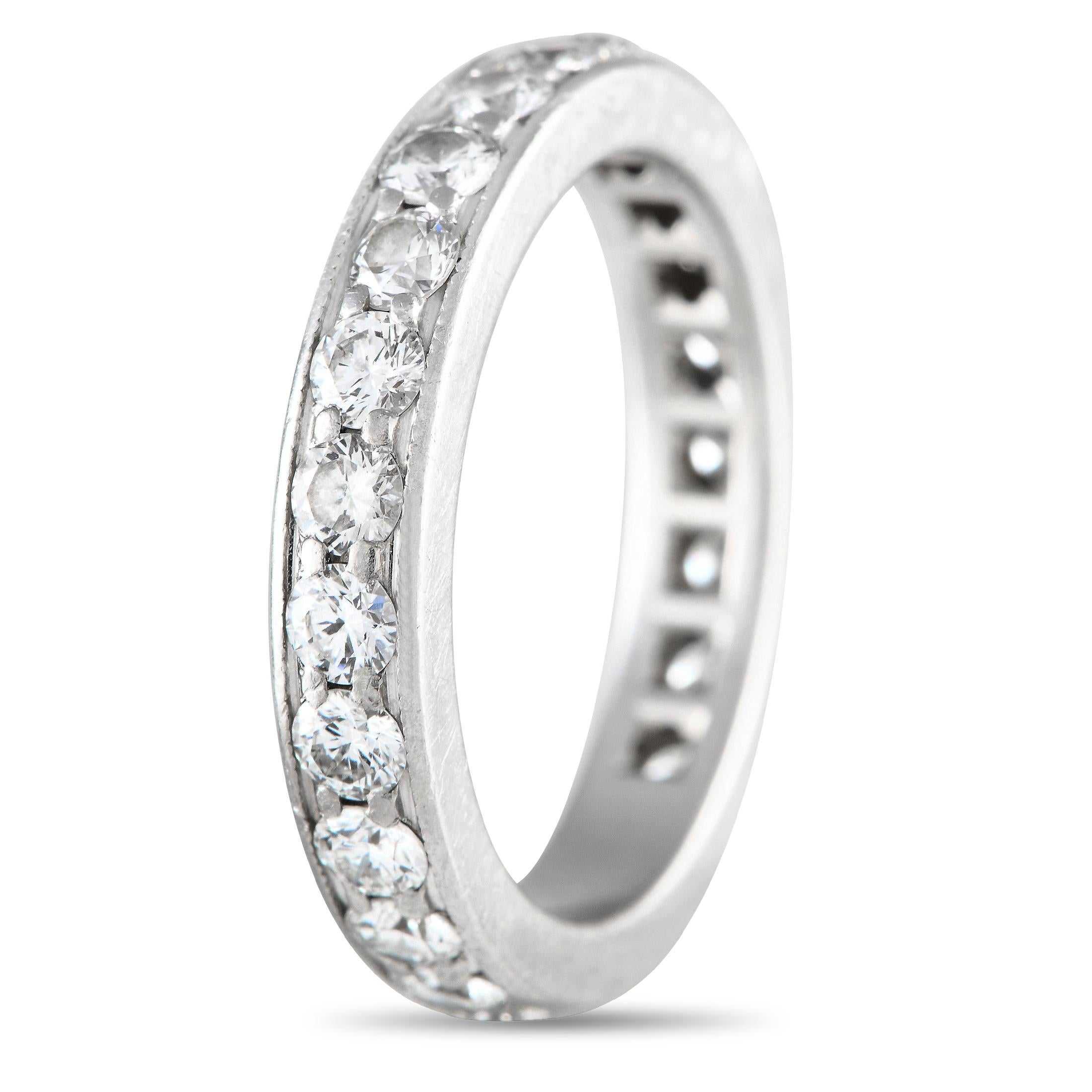 The perfect token of eternal love. This Tiffany & Co. eternity ring has its band crafted in everlasting platinum. Its entire circumference is meticulously detailed with high-quality diamonds. The ring's top dimensions measure 15mm by 3mm.

This
